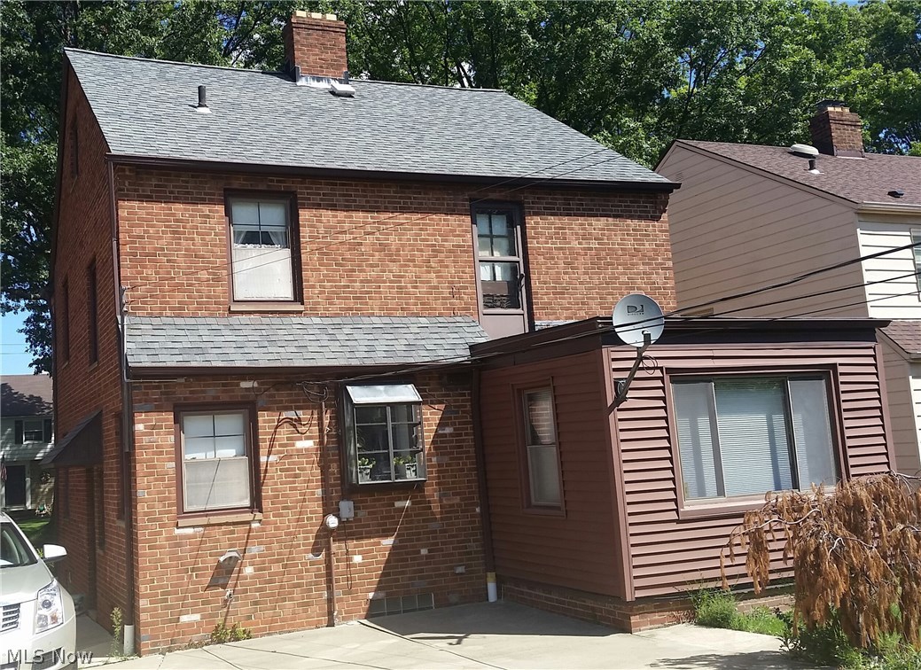4198 Bushnell Road University Heights, OH 44118 - Photo 2 of 6 Look at this brick on all four sides. Lots of beautiful concrete for a turn around or to put your patio set.