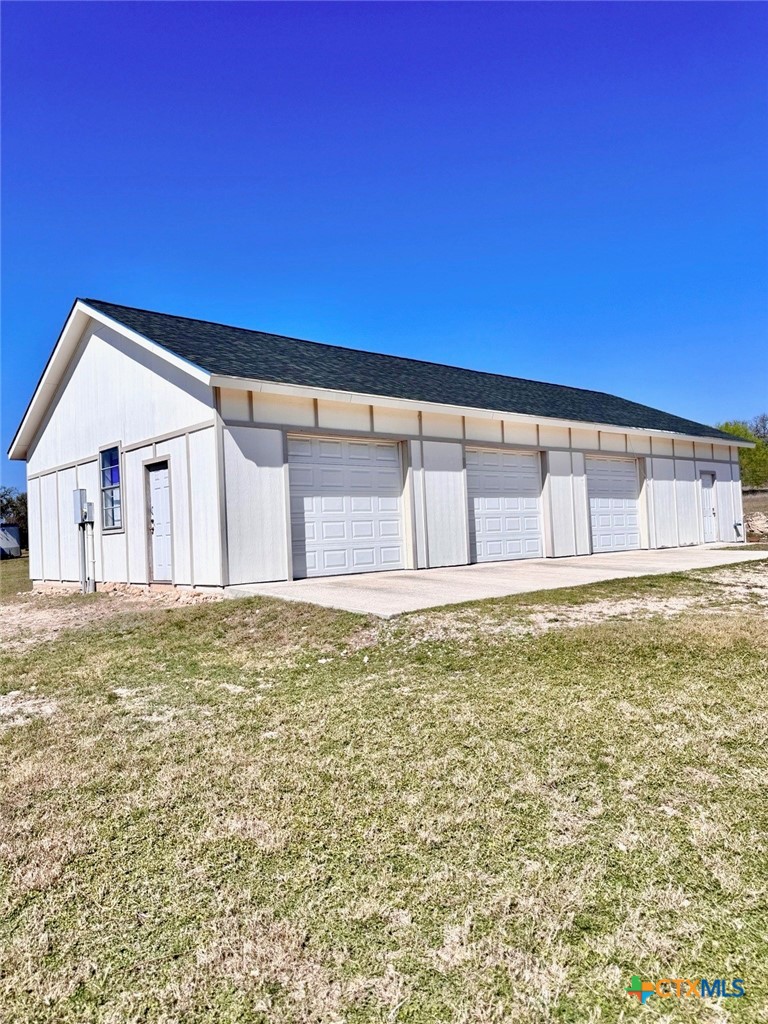 187 Tracks Trail Center Point, TX 78010 - Photo 7 of 41 3 car detached garage with workshop