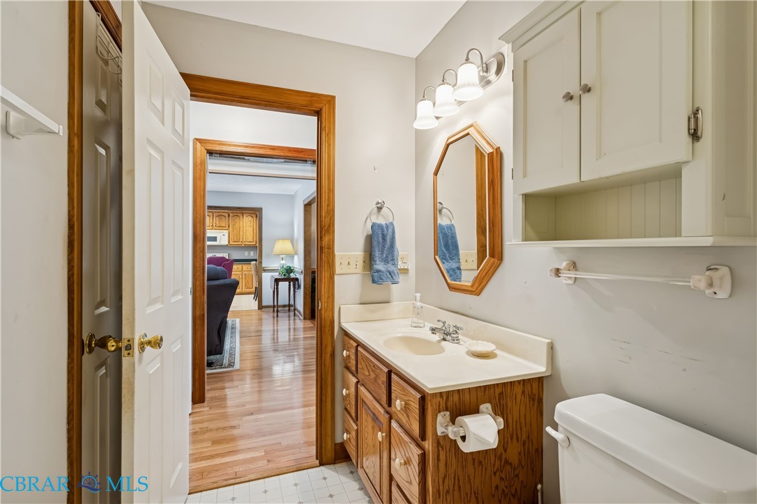 6253 Ark Road Gloucester, VA 23061 - Photo 17 of 38 Half bathroom featuring vanity and light floors