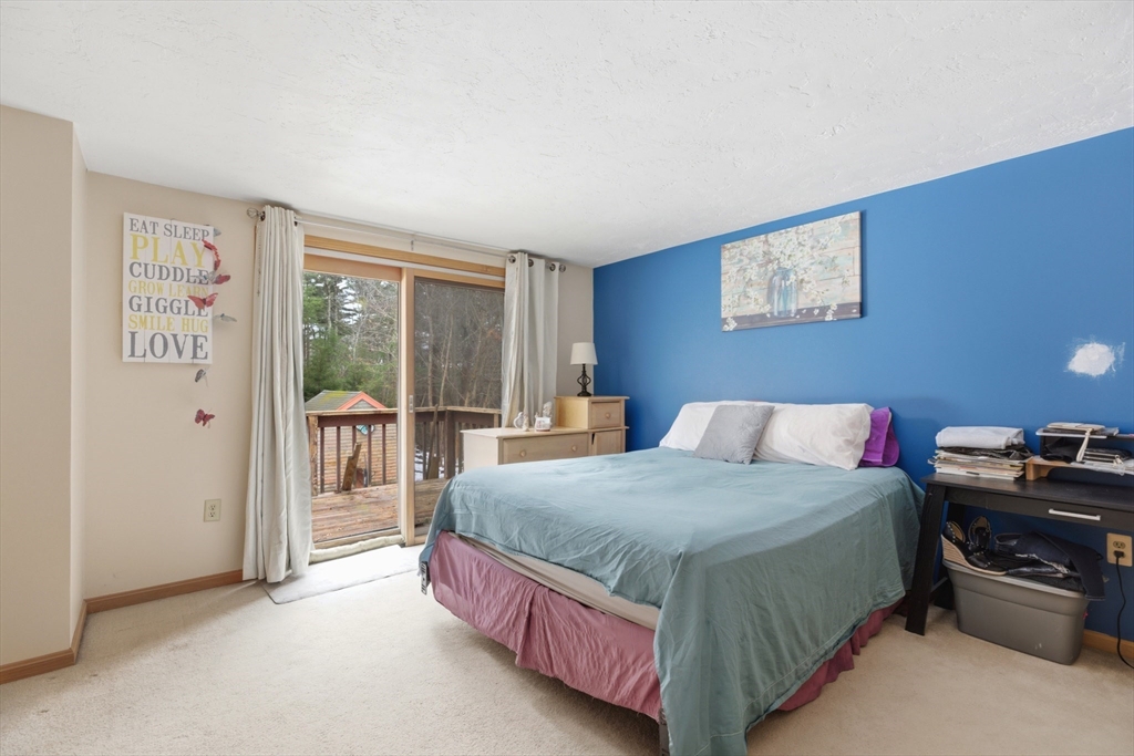 10 Wapping Road Kingston, MA 02364 - Photo 11 of 21 a bedroom with a bed and a table