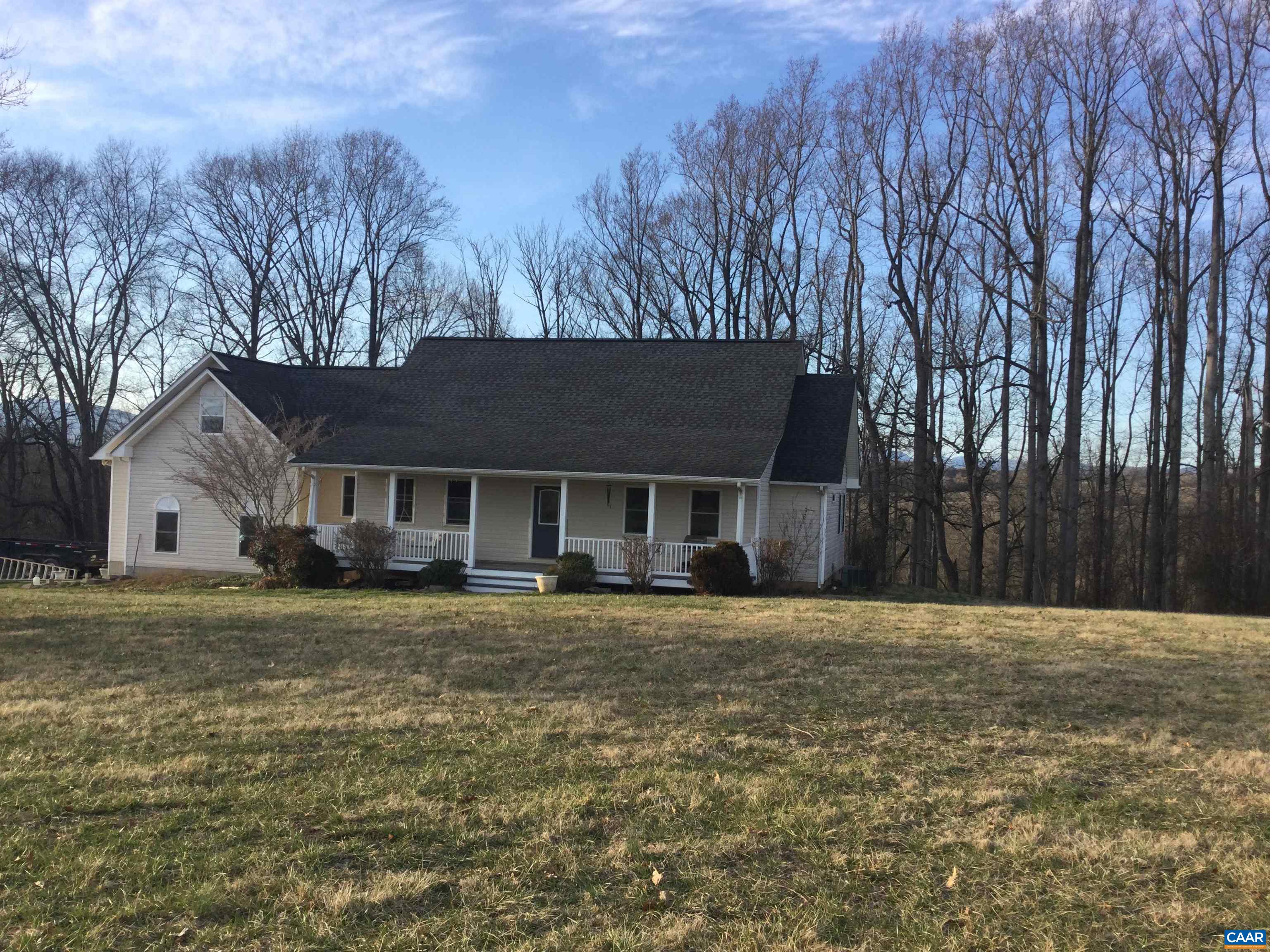 5211 Fredericksburg Road Ruckersville, VA 22968 - Photo 11 of 33 a front view of a house with a yard