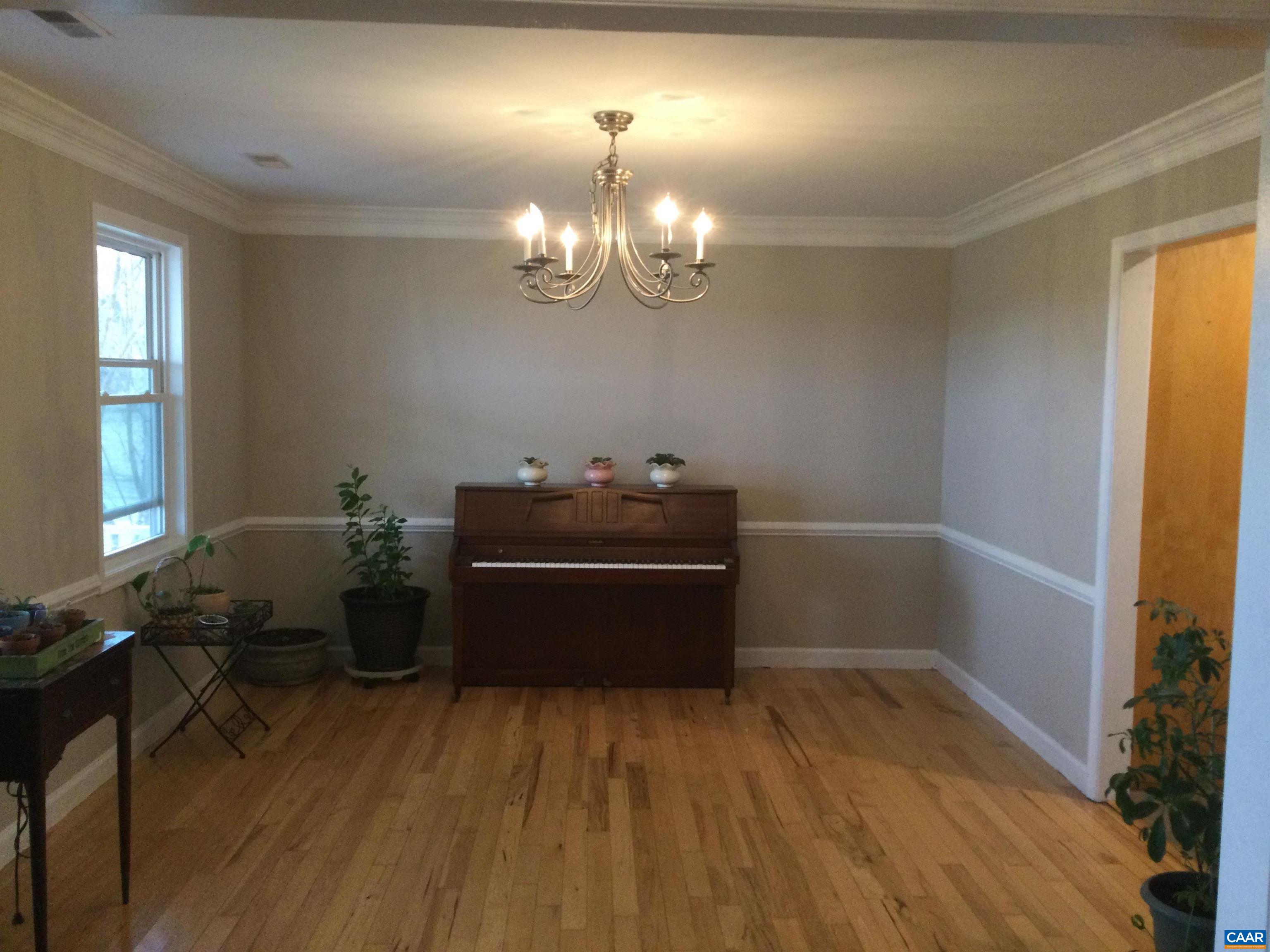 5211 Fredericksburg Road Ruckersville, VA 22968 - Photo 14 of 33 a room with wooden floor