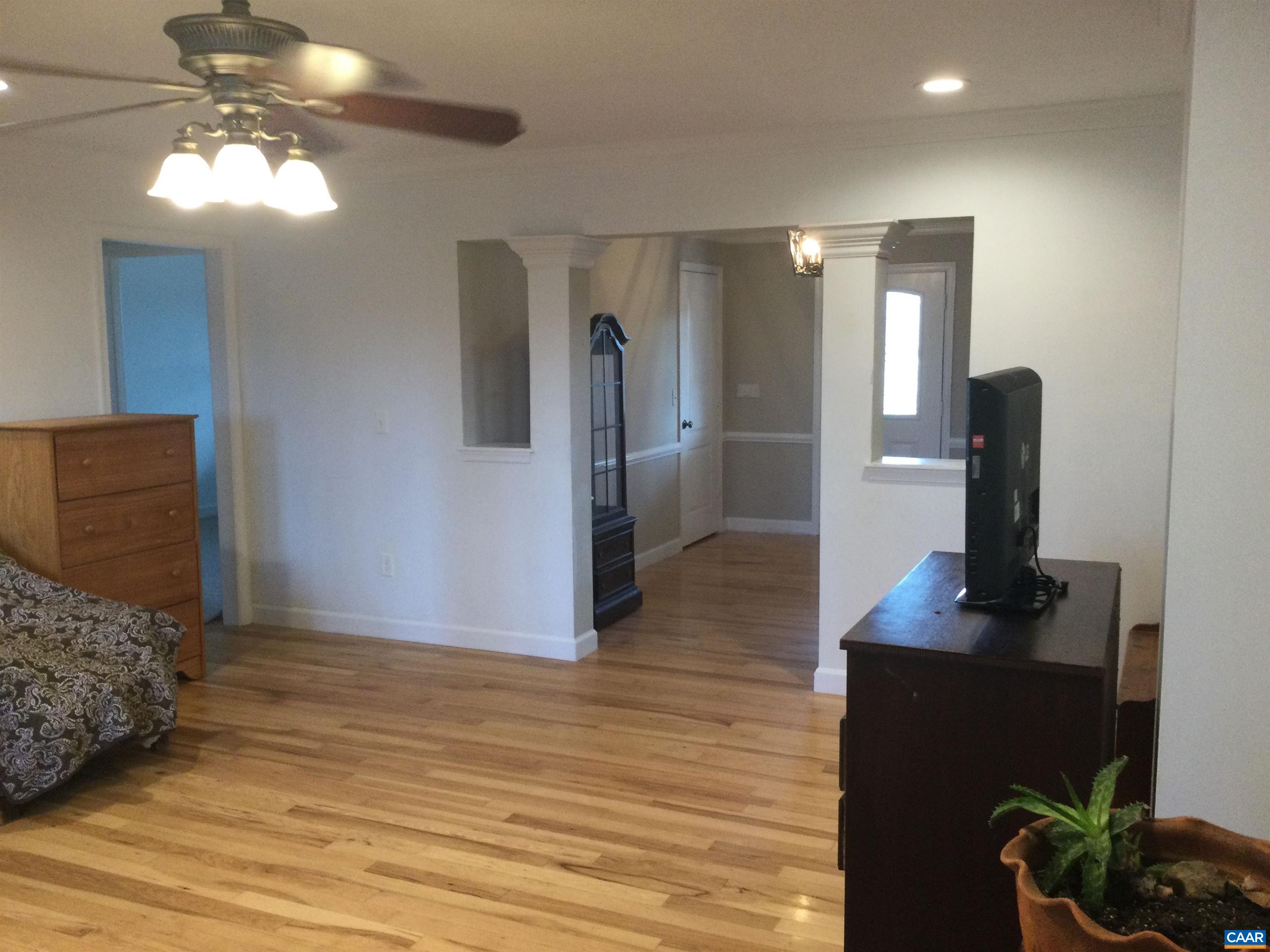 5211 Fredericksburg Road Ruckersville, VA 22968 - Photo 17 of 33 a view of a workspace with furniture and wooden floor