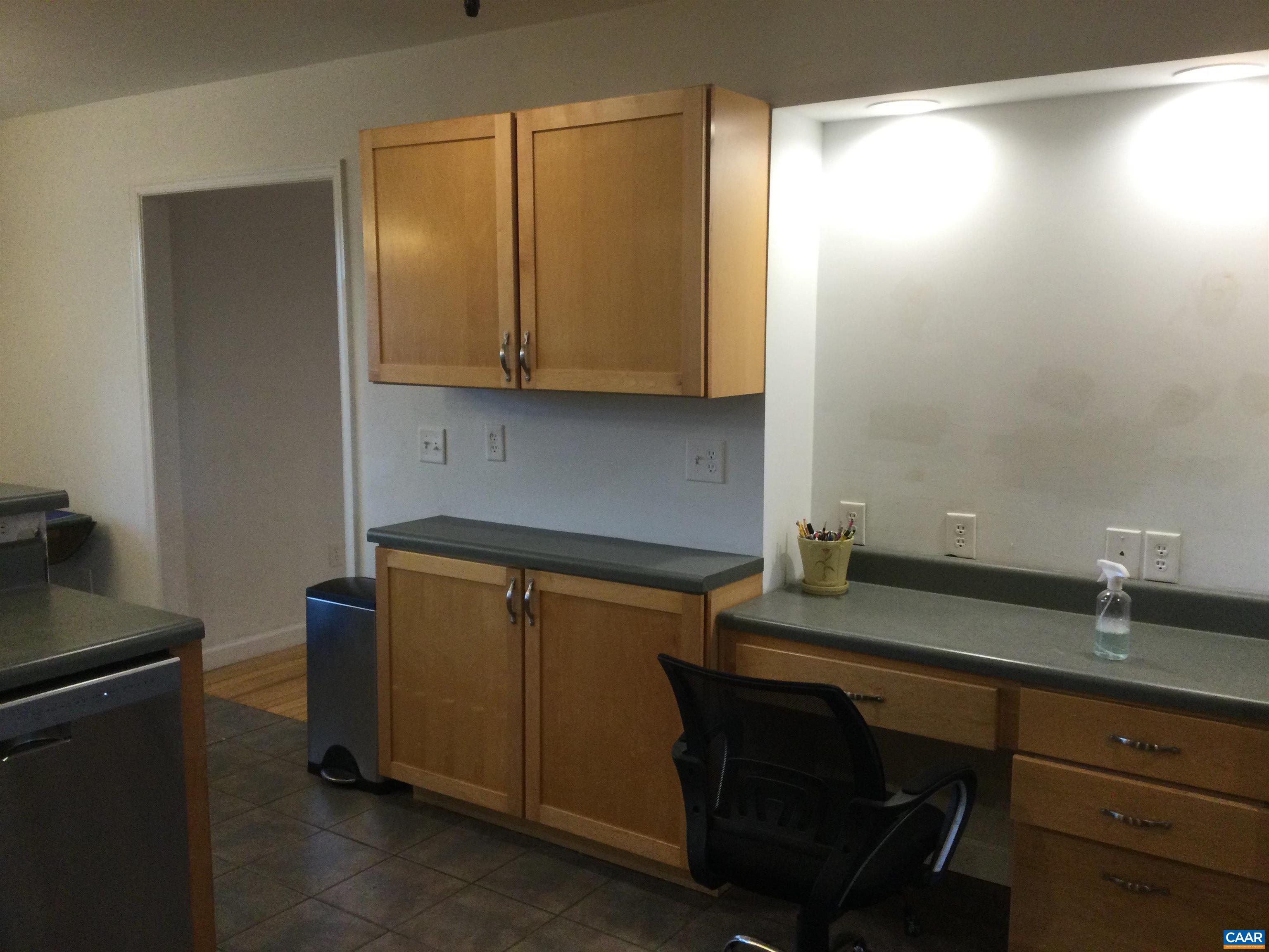 5211 Fredericksburg Road Ruckersville, VA 22968 - Photo 21 of 33 a room with cabinets and furniture