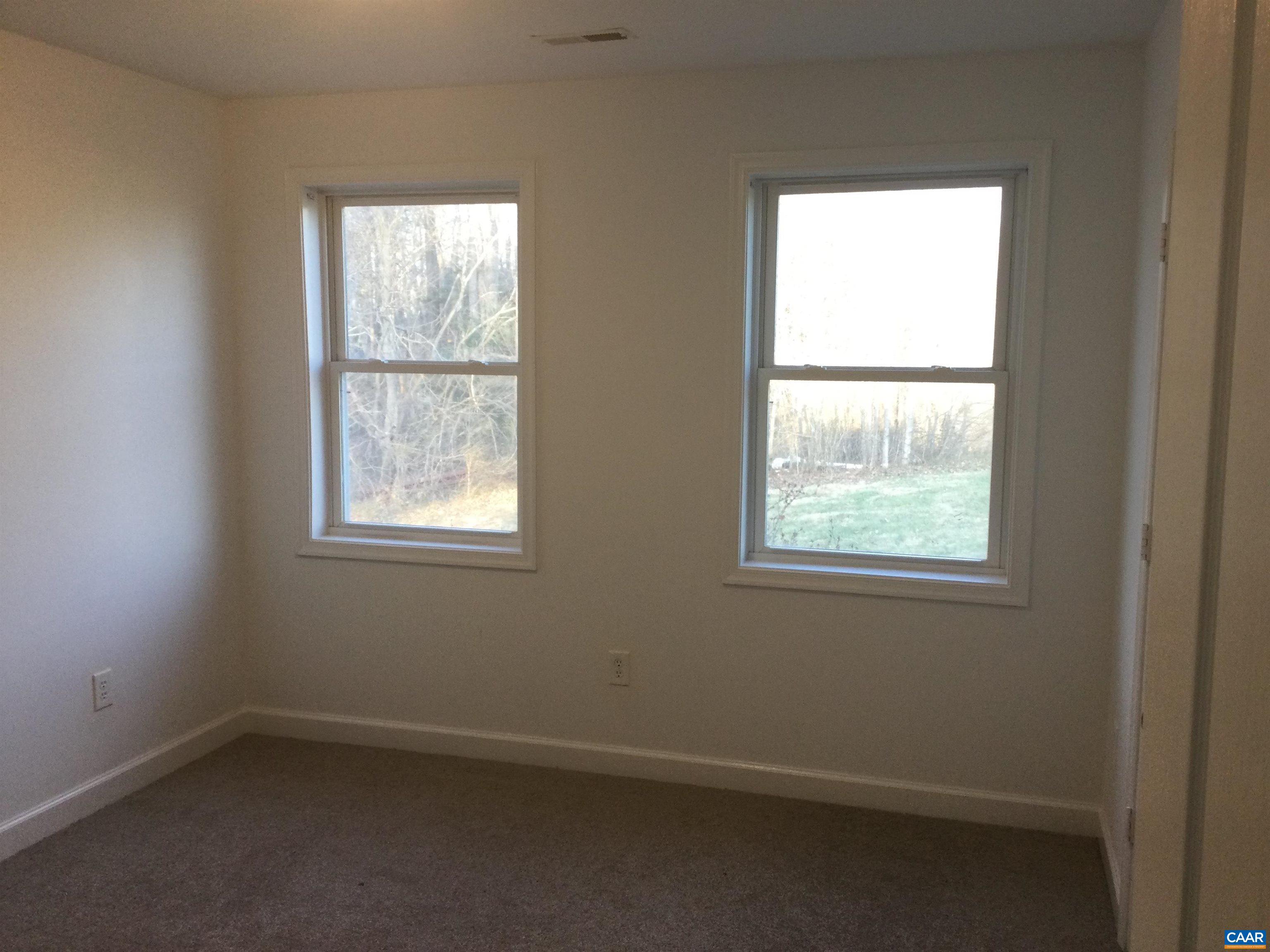 5211 Fredericksburg Road Ruckersville, VA 22968 - Photo 26 of 33 an empty room with a window