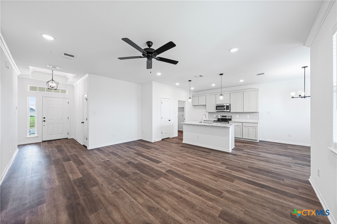8023 Pineridge Way Temple, TX 76502 - Photo 12 of 28 a view of kitchen with wooden floor and window