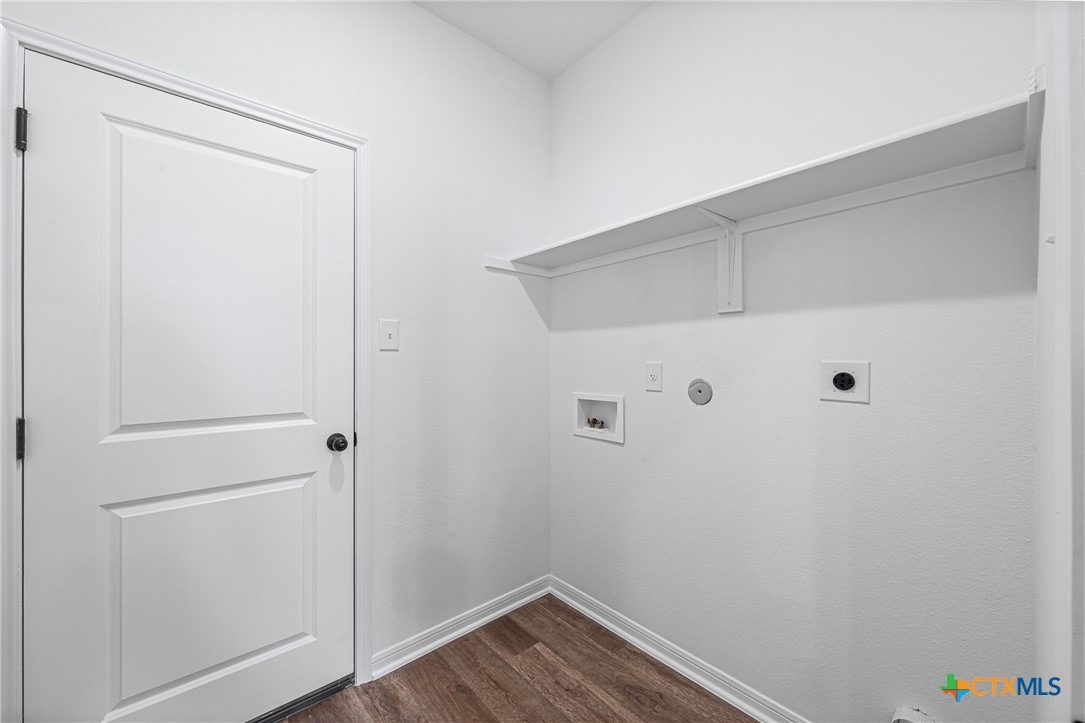 8023 Pineridge Way Temple, TX 76502 - Photo 21 of 28 a view of small space with racks on the wall