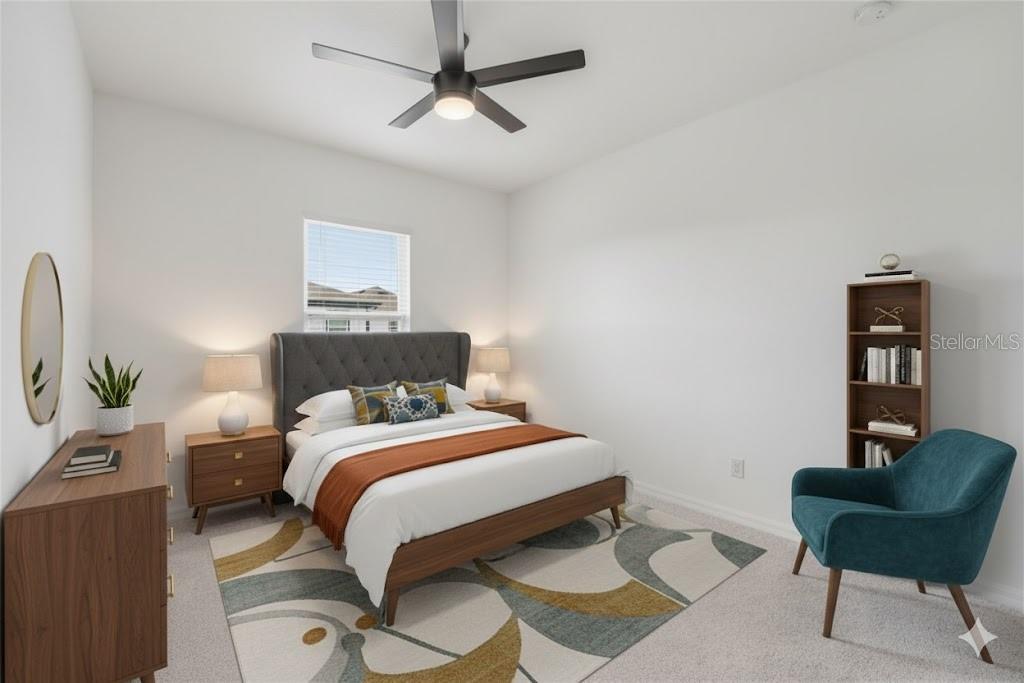 6552 Barnstorm Way St. Cloud, FL 34771 - Photo 14 of 17 a bedroom with a bed and a chair