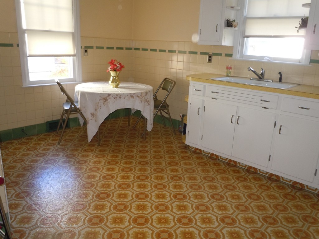 57 Grandview Street Springfield, MA 01118 - Photo 3 of 16 a living room with a sink