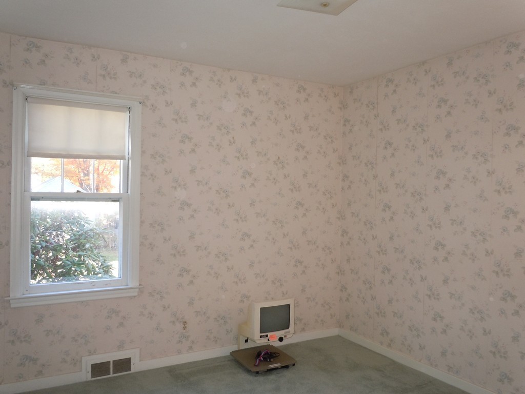 57 Grandview Street Springfield, MA 01118 - Photo 7 of 16 a room with a window