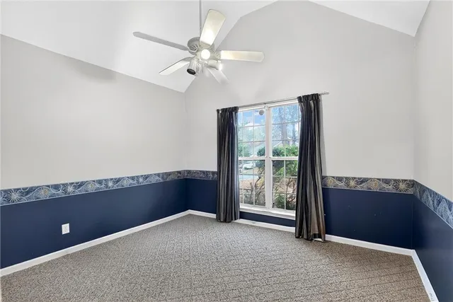 a view of an empty room with window