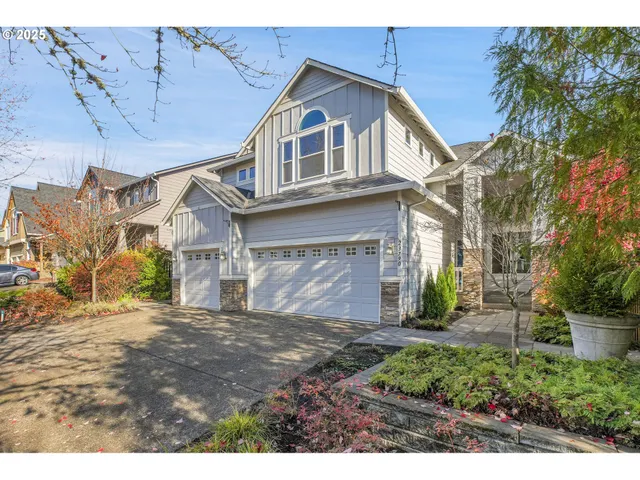 a view of a big house with a street