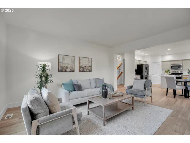a living room with furniture and a couch