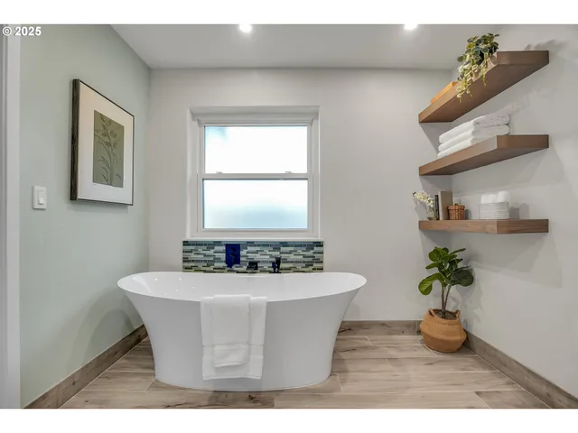 a view of a dining room with furniture window and flowerpot