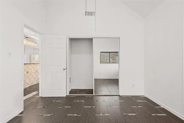 a bathroom with a sink toilet a mirror and shower