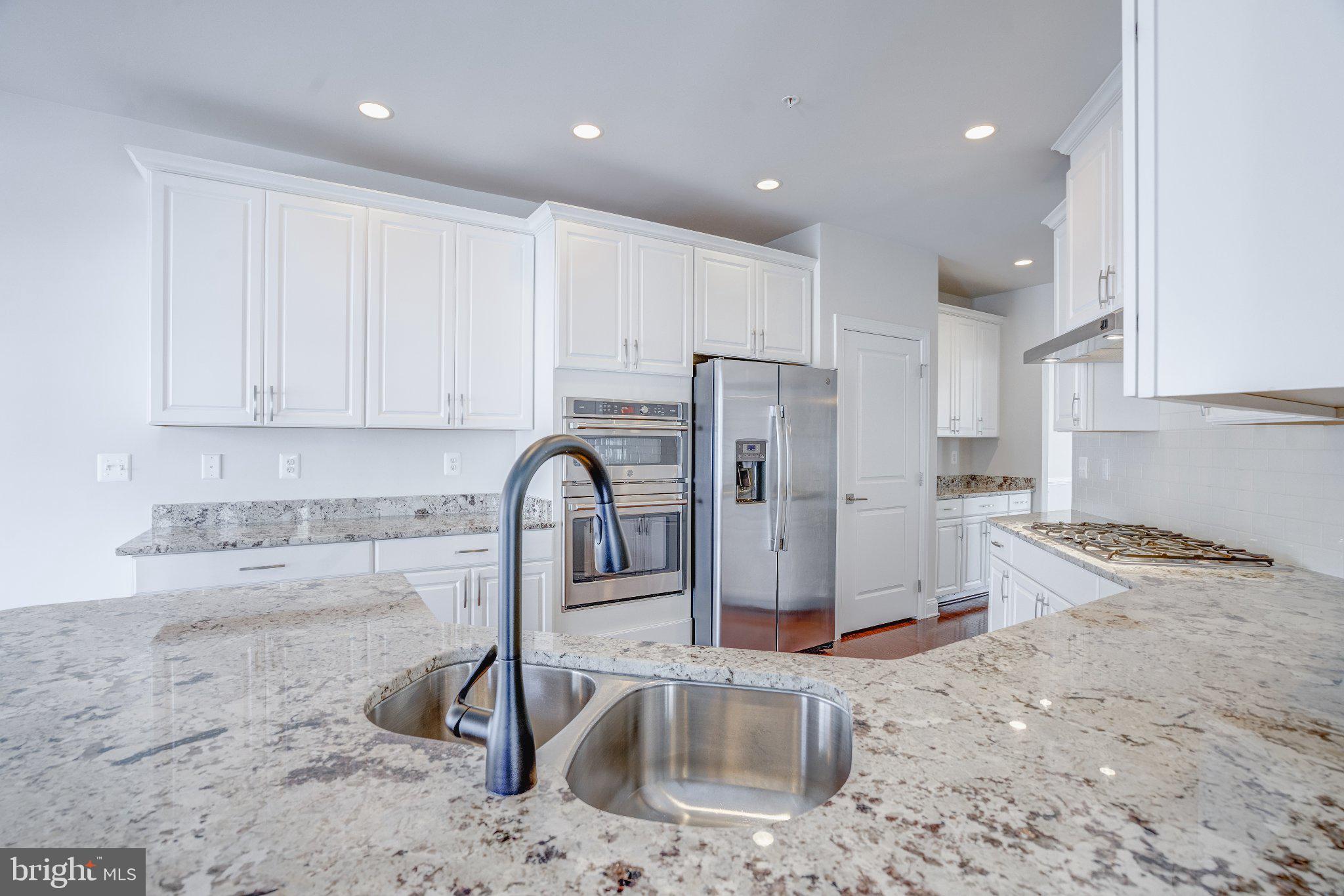 2517 Cherry Tree Road Hanover, MD 21076 - Photo 17 of 61 Sleek kitchen with modern finishes.