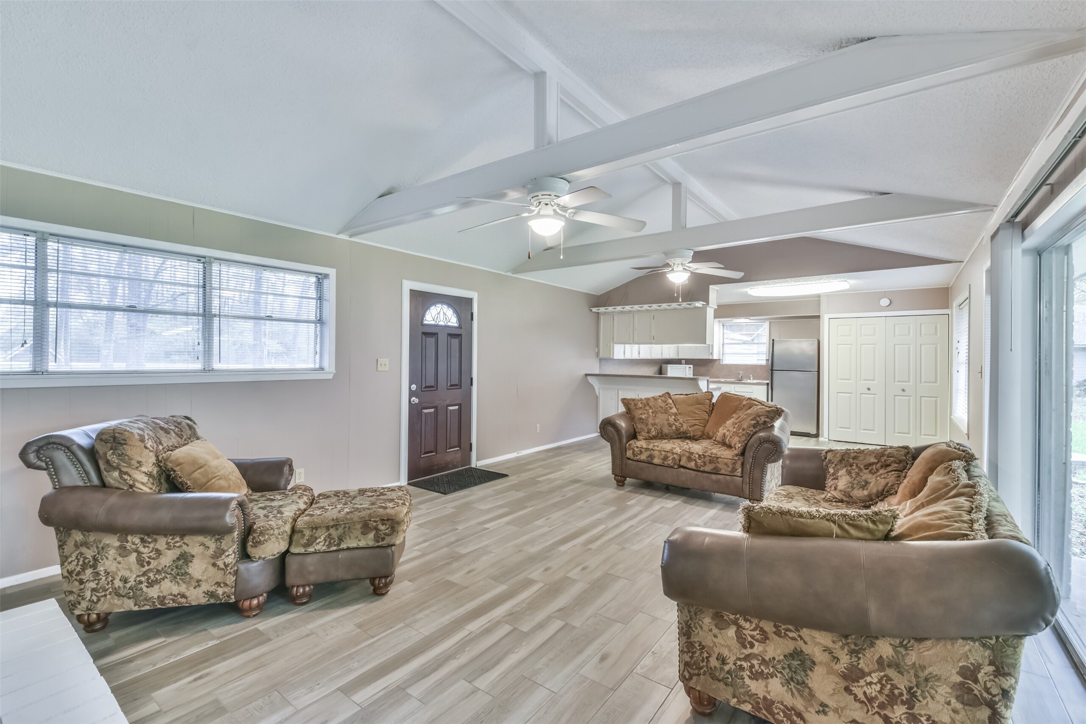 23807 Red Oak Drive Spring, TX 77389 - Photo 3 of 26 a living room with furniture and a couch