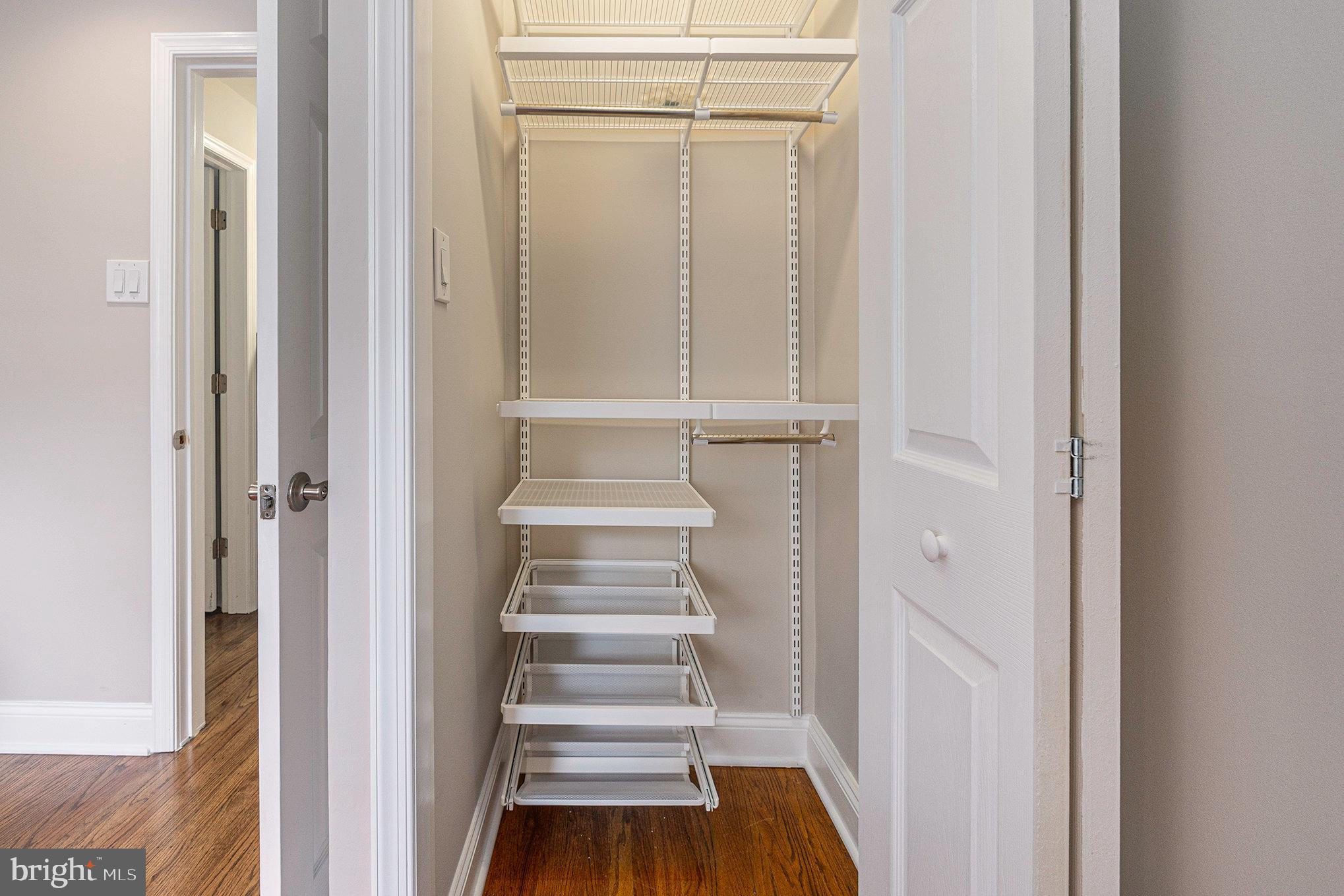 556 Forest Road Wayne, PA 19087 - Photo 15 of 35 a view of a hallway with wooden floor and entryway