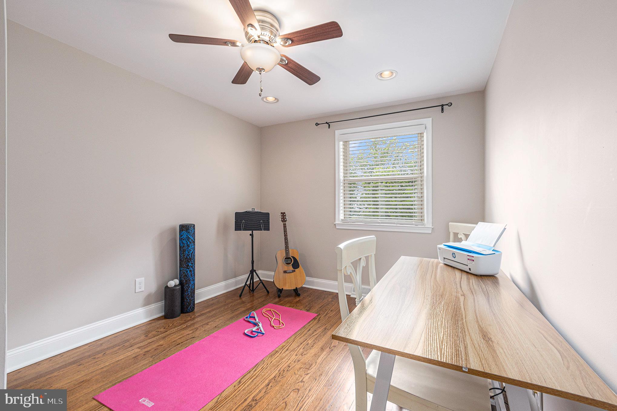 556 Forest Road Wayne, PA 19087 - Photo 19 of 35 a bedroom with furniture and a large window