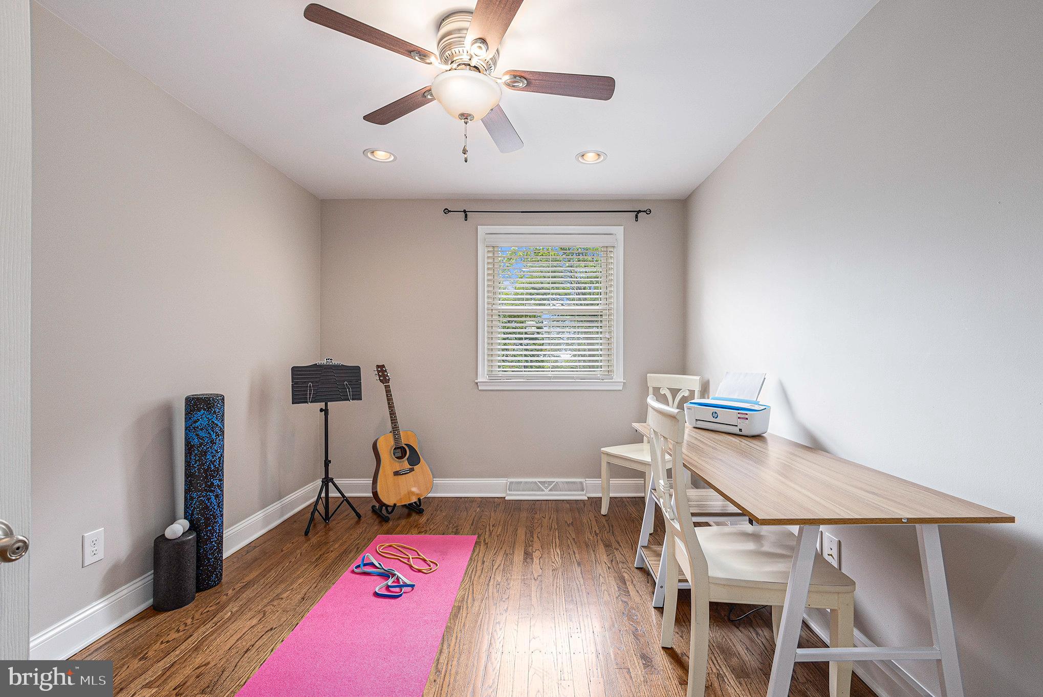 556 Forest Road Wayne, PA 19087 - Photo 20 of 35 a view of a workspace with furniture and a window