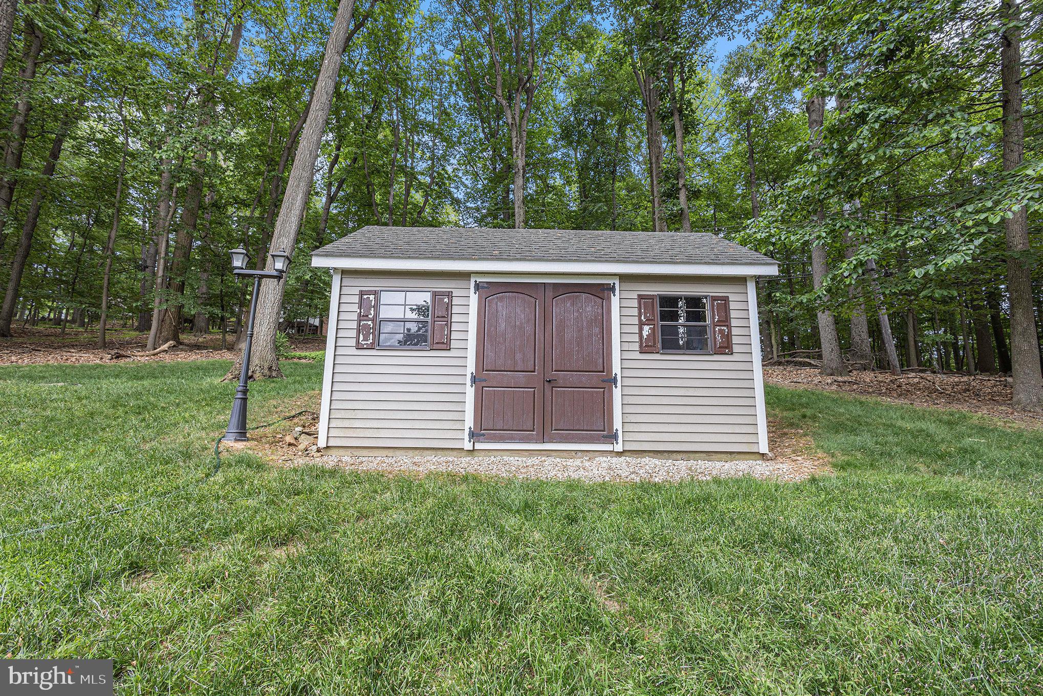 556 Forest Road Wayne, PA 19087 - Photo 32 of 35 a view of a house with a yard