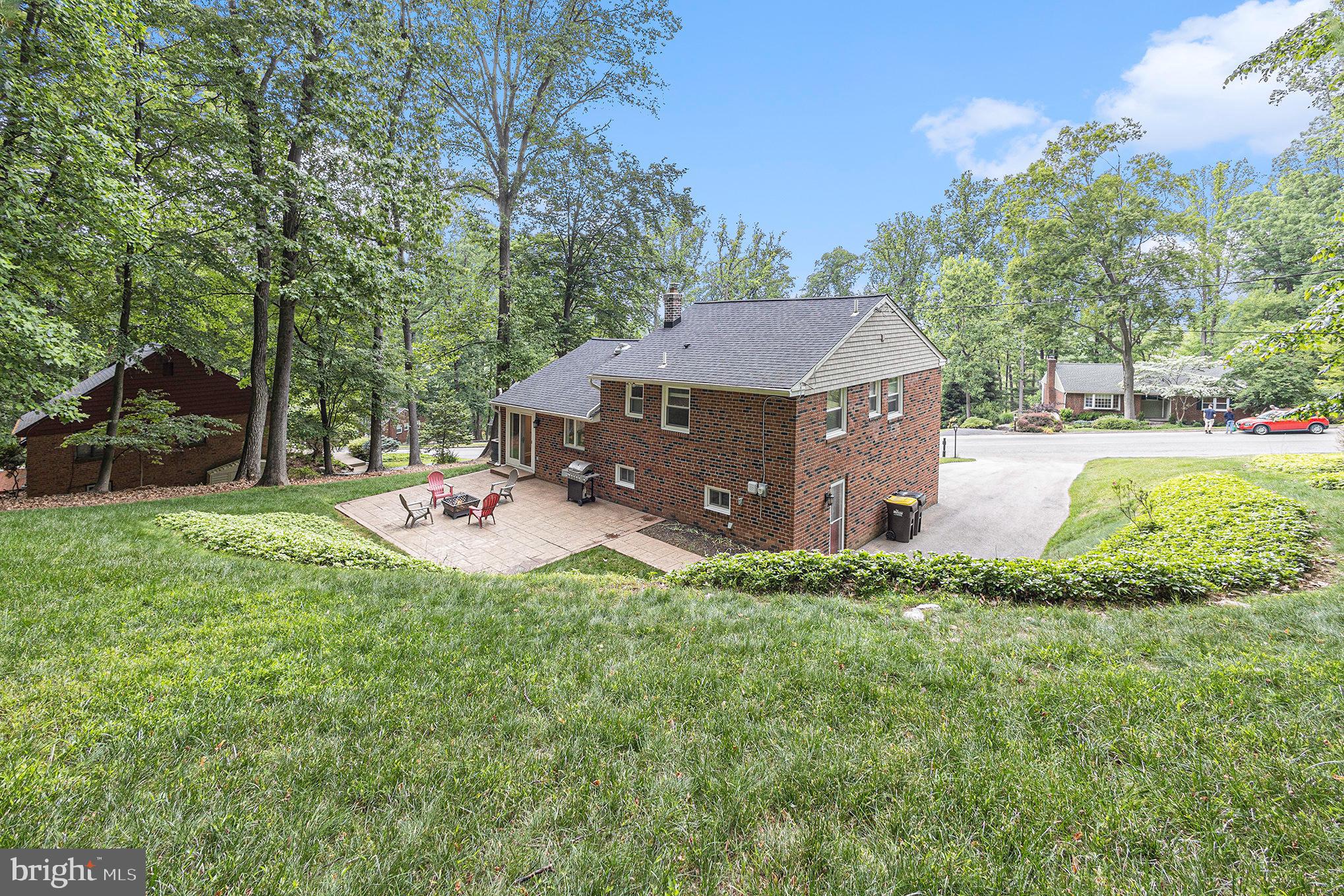 556 Forest Road Wayne, PA 19087 - Photo 33 of 35 a aerial view of a house with backyard and trees