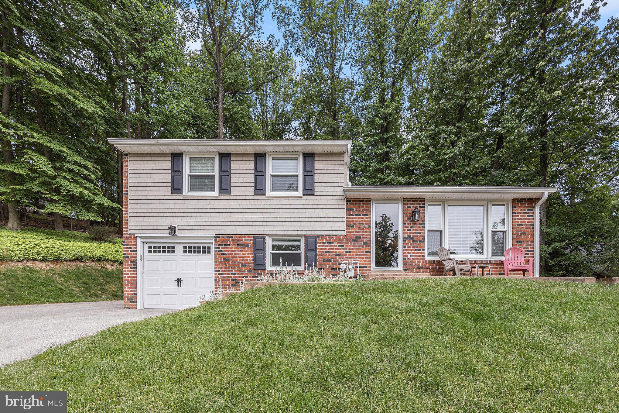 556 Forest Road Wayne, PA 19087 - Photo 4 of 35 front view of a house with a yard
