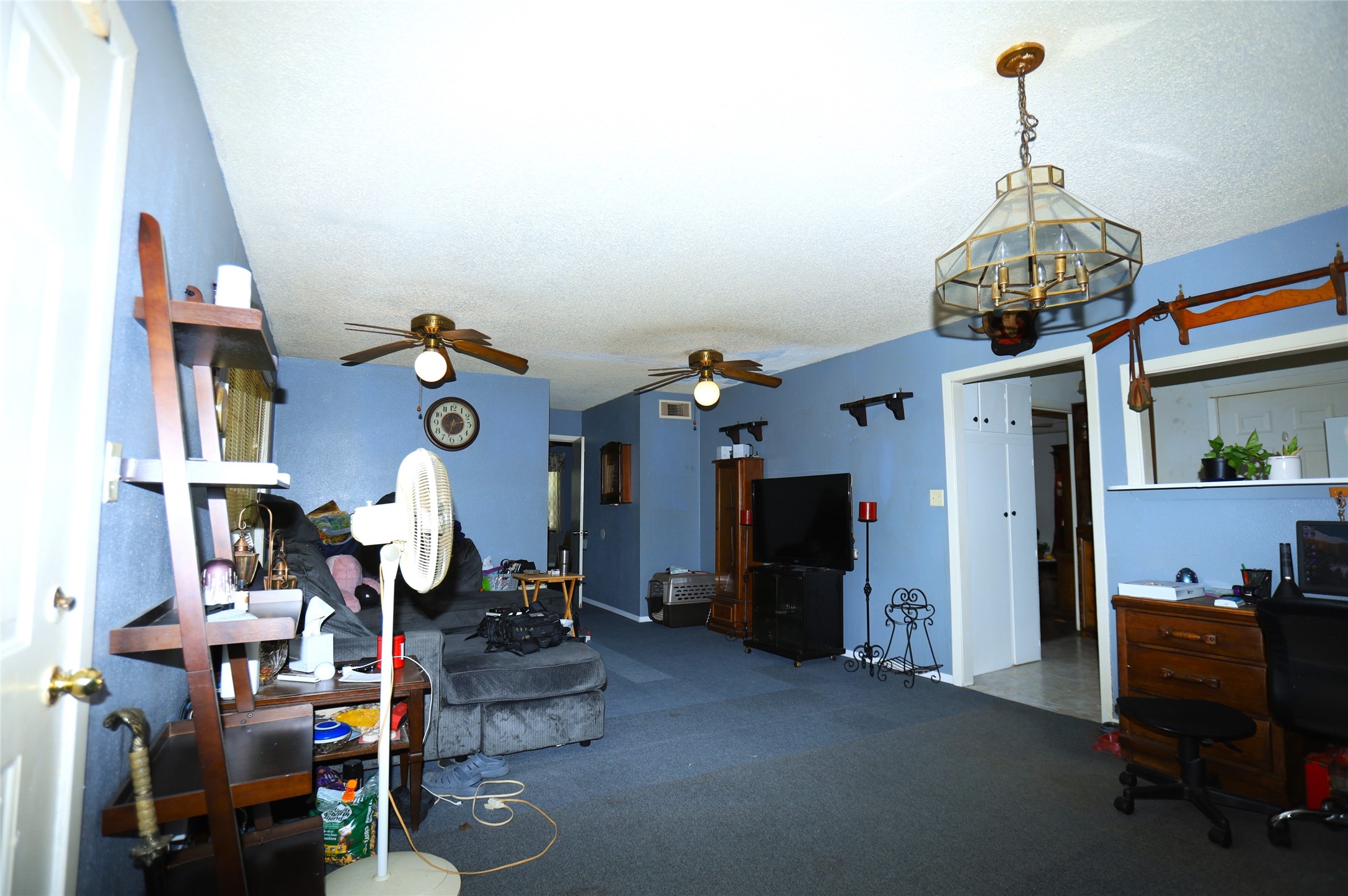 405 Center Way Lake Jackson, TX 77566 - Photo 12 of 21 a view of hall way with furniture and chandelier