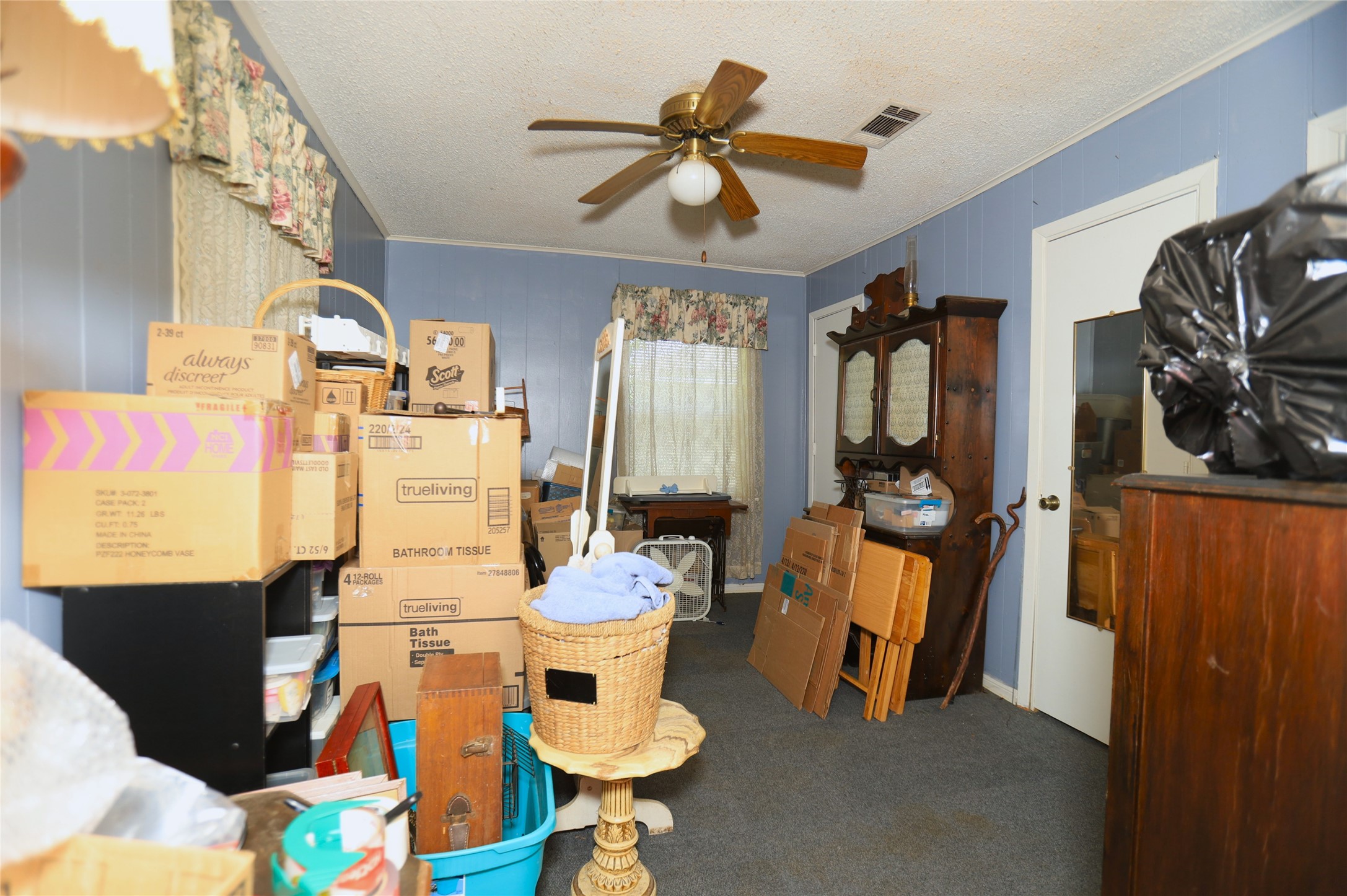 405 Center Way Lake Jackson, TX 77566 - Photo 16 of 21 a view of a dining room with furniture and a chandelier fan