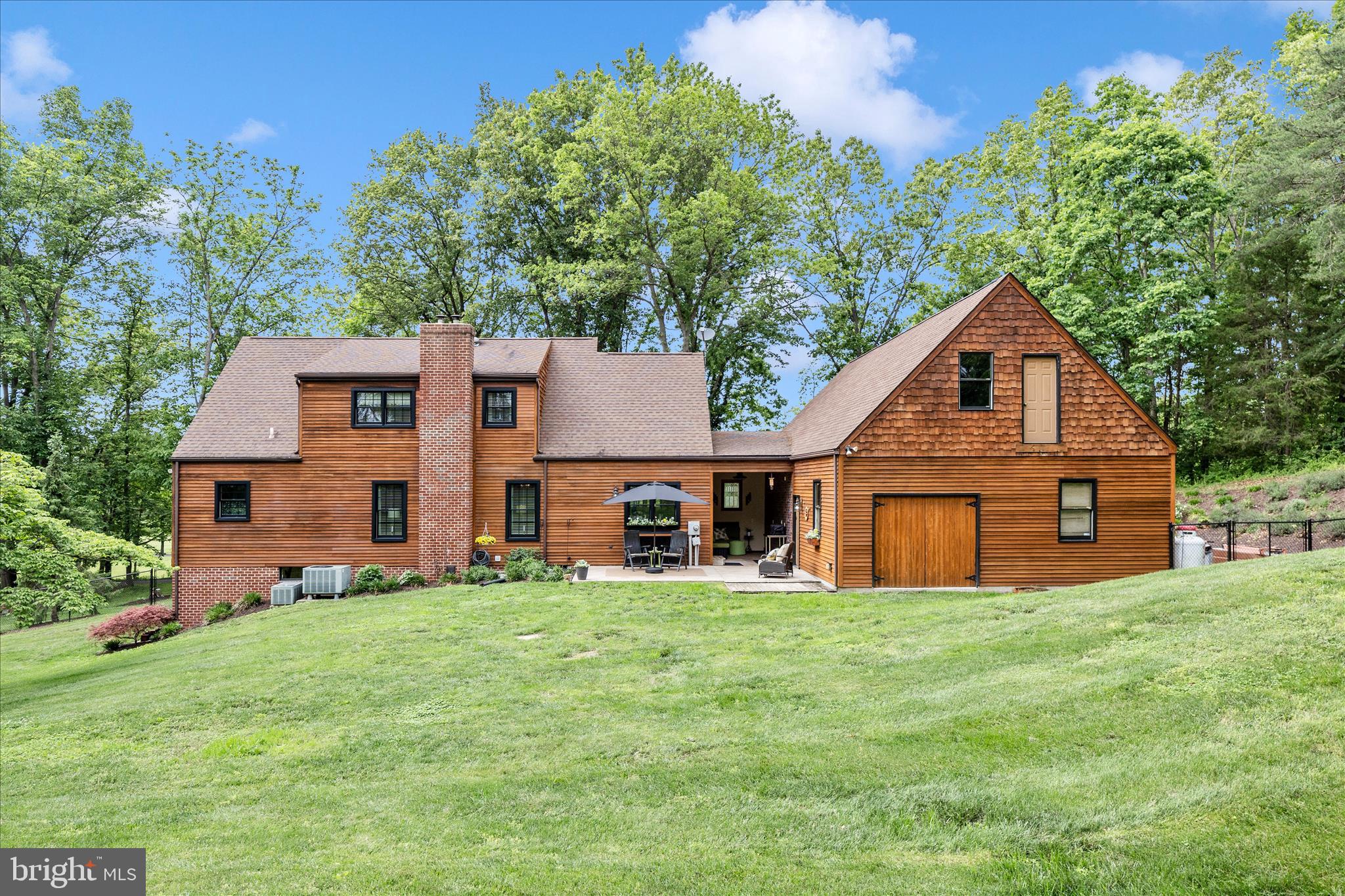 15810 Spade Road Hagerstown, MD 21740 - Photo 65 of 76 a front view of house with yard and trees in the background