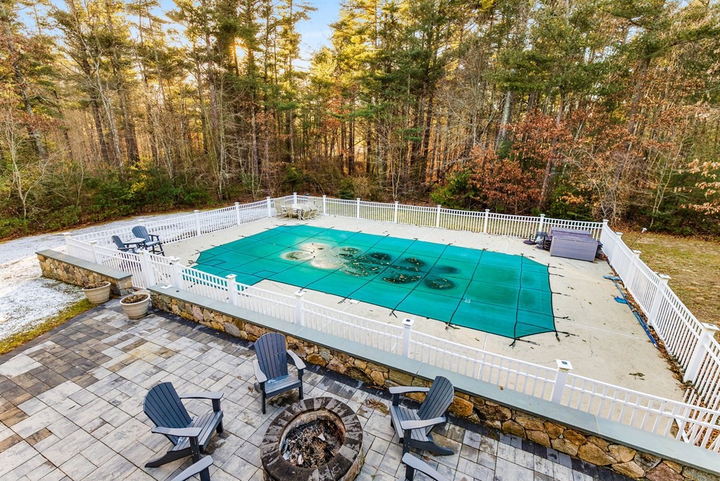47 Mayflower Lane Rochester, MA 02770 - Photo 11 of 40 a view of a backyard with sitting area