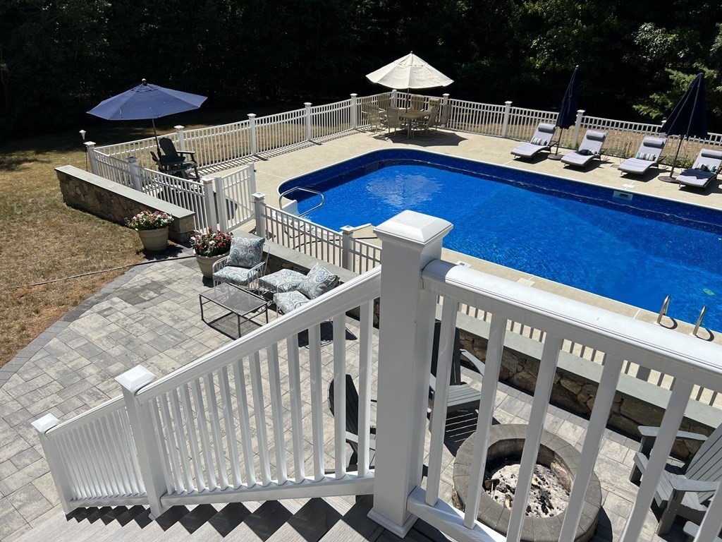 47 Mayflower Lane Rochester, MA 02770 - Photo 2 of 40 a view of deck with patio and wooden floor