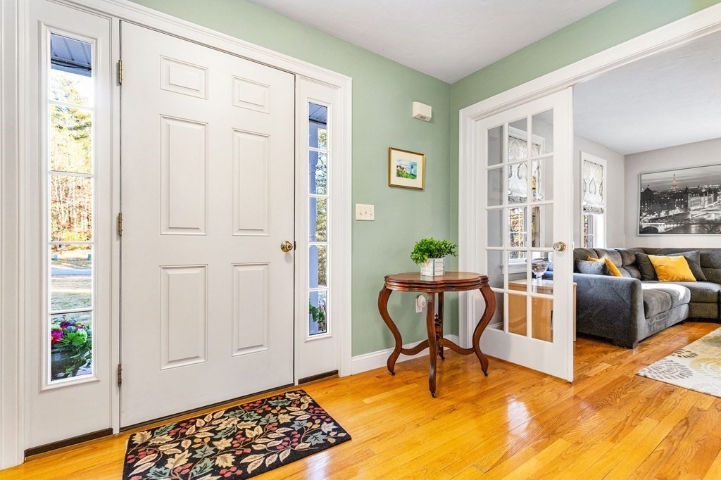 47 Mayflower Lane Rochester, MA 02770 - Photo 38 of 40 a view of a livingroom with furniture and windows