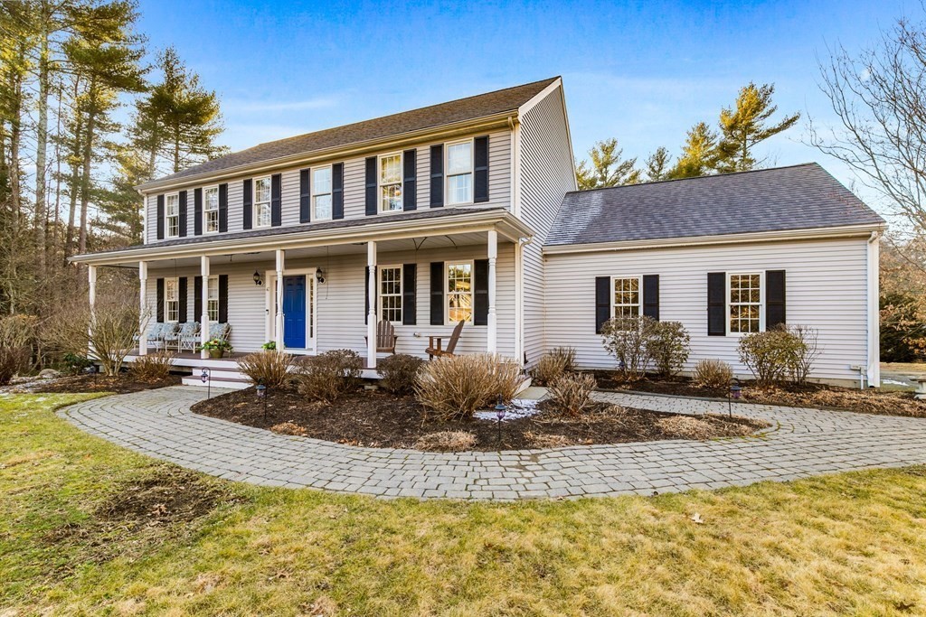 47 Mayflower Lane Rochester, MA 02770 - Photo 8 of 40 a front view of a house with yard and seating space