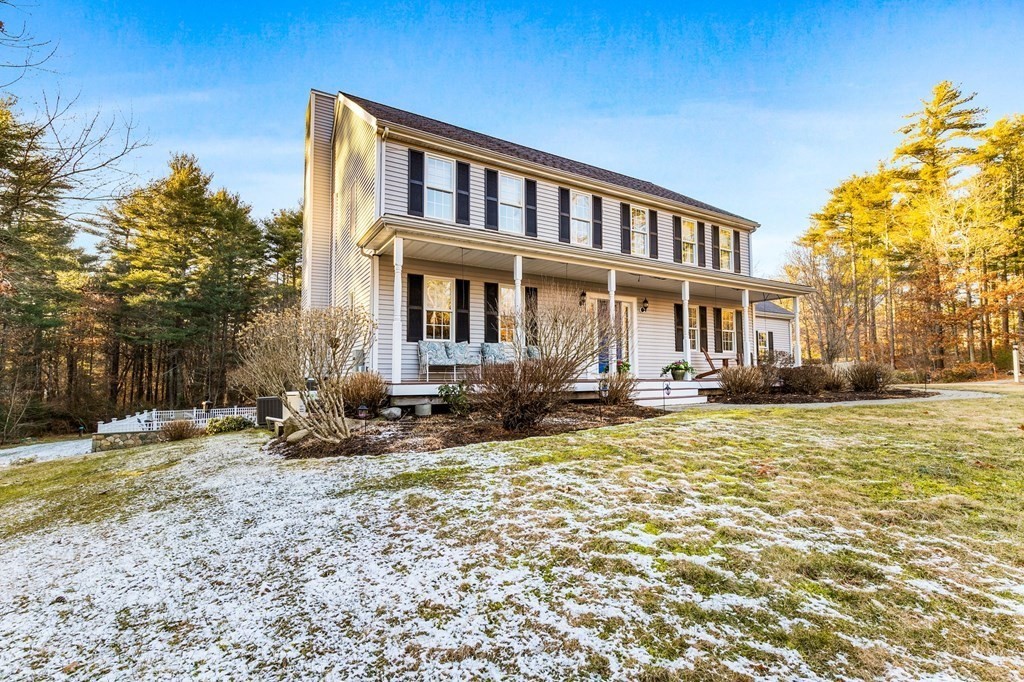47 Mayflower Lane Rochester, MA 02770 - Photo 9 of 40 a front view of a house with swimming pool and sitting area