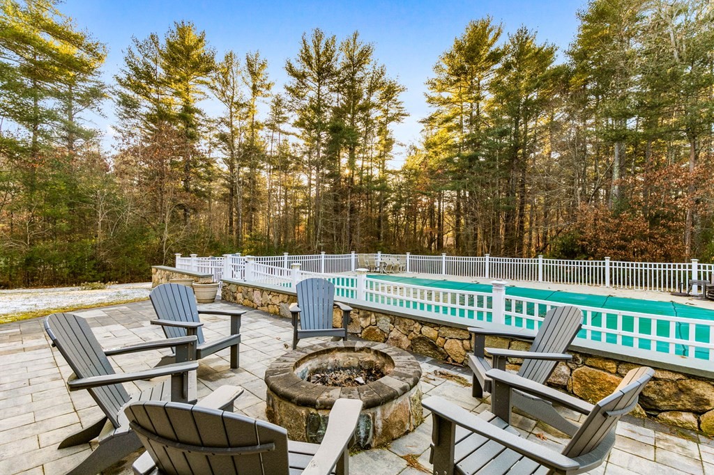 47 Mayflower Lane Rochester, MA 02770 - Photo 10 of 40 a view of a chairs and table on the terrace