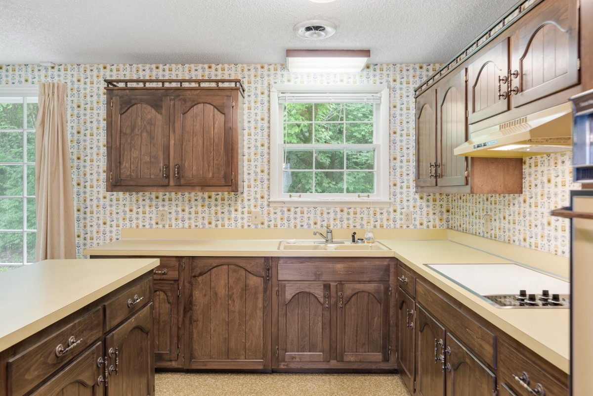 6908 River Rd Pike Nashville, TN 37209 - Photo 20 of 47 a bathroom with a sink and a bathtub