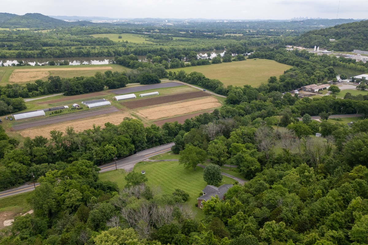 6908 River Rd Pike Nashville, TN 37209 - Photo 43 of 47 an aerial view of river residential houses with outdoor space and river