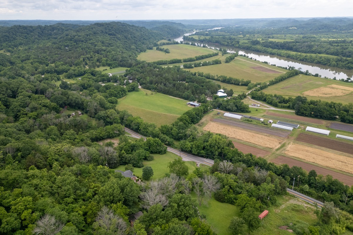 6908 River Rd Pike Nashville, TN 37209 - Photo 46 of 47 an aerial view of a city with mountains