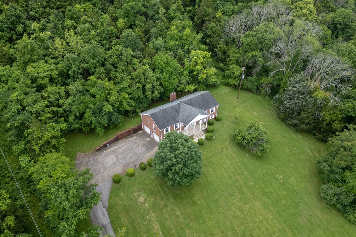 6908 River Rd Pike Nashville, TN 37209 - Photo 8 of 47 an aerial view of a garden with plants