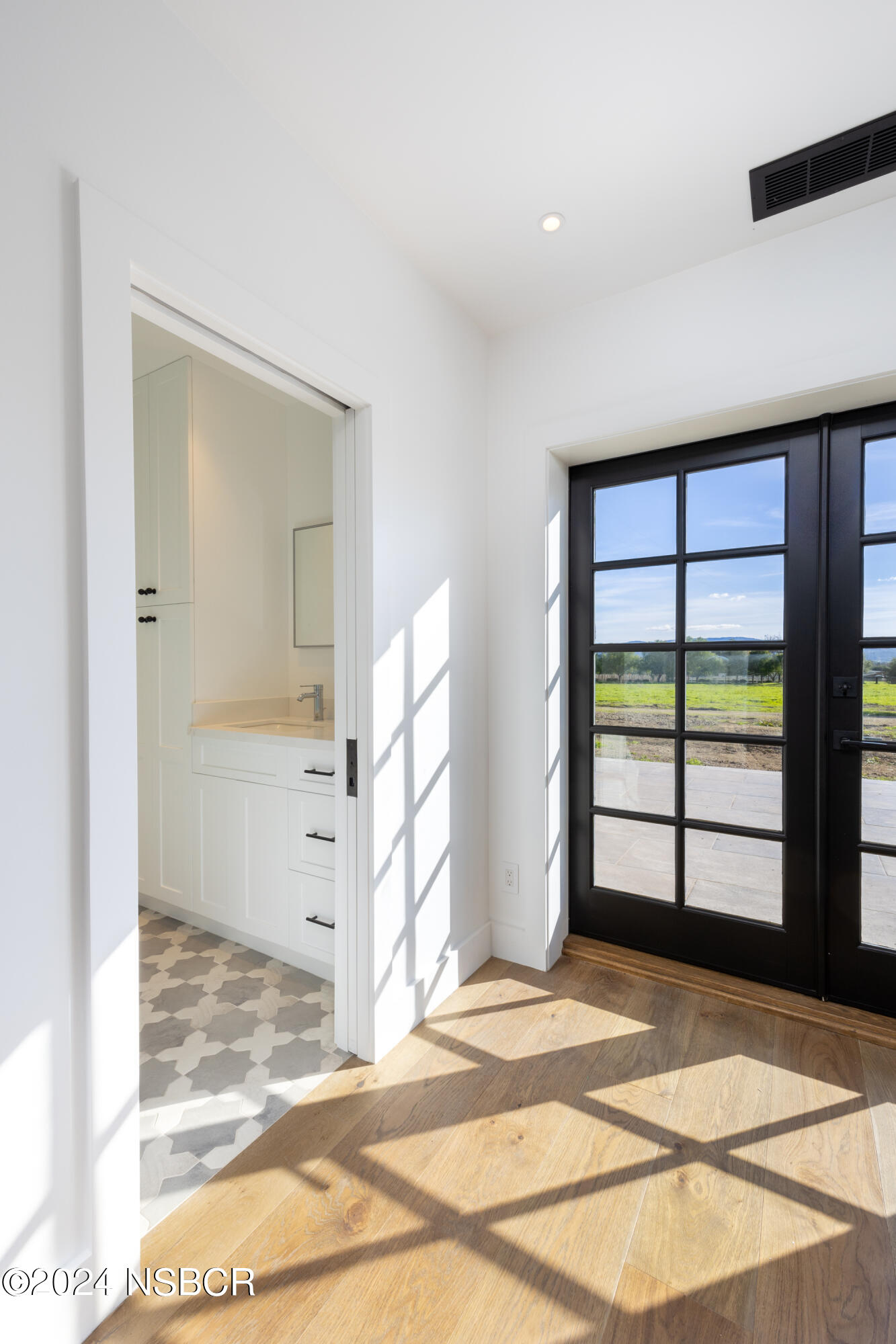 2380 North Refugio Road Santa Ynez, CA 93460 - Photo 17 of 38 a view of a livingroom with a hall and a window