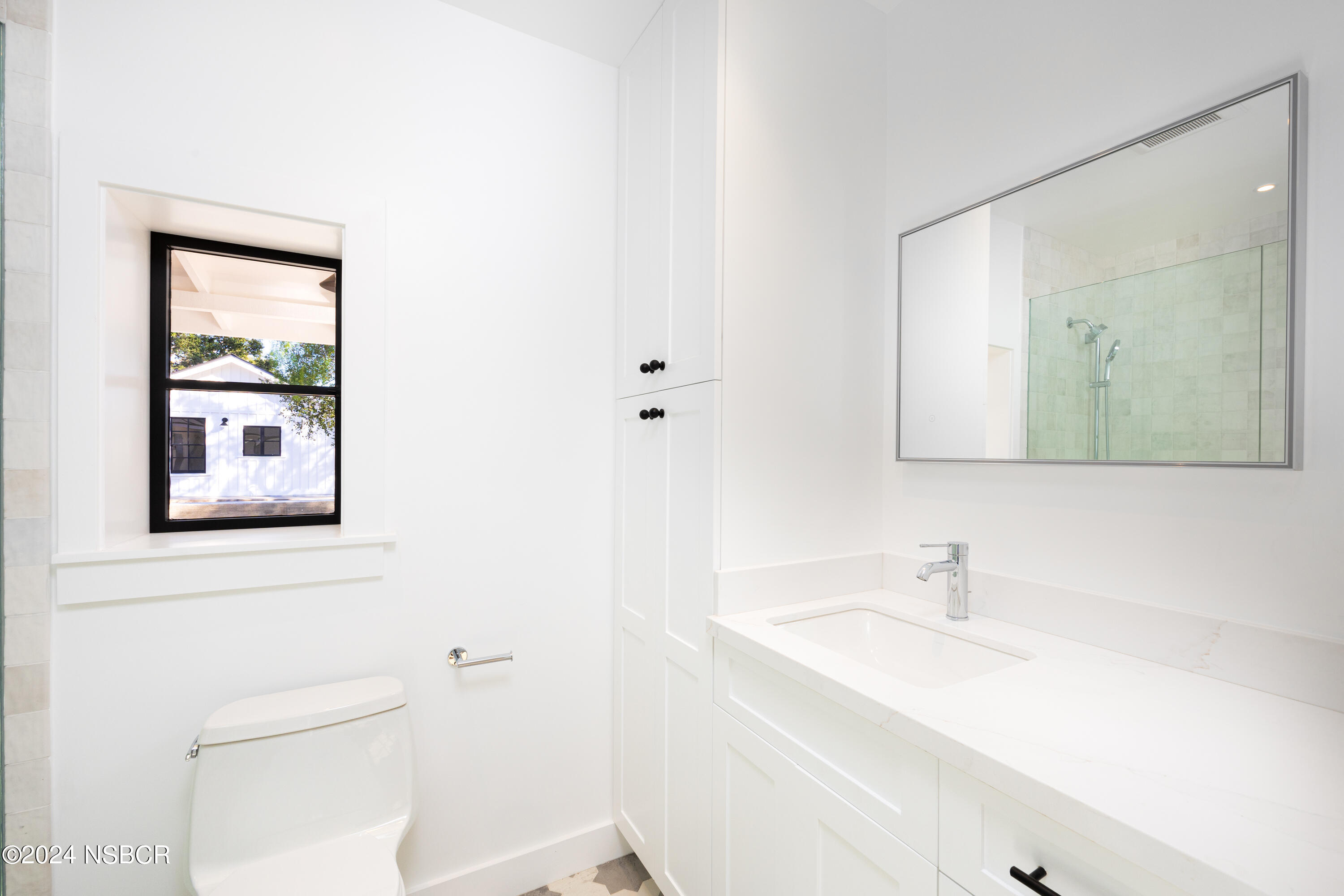 2380 North Refugio Road Santa Ynez, CA 93460 - Photo 18 of 38 a bathroom with a sink and a mirror