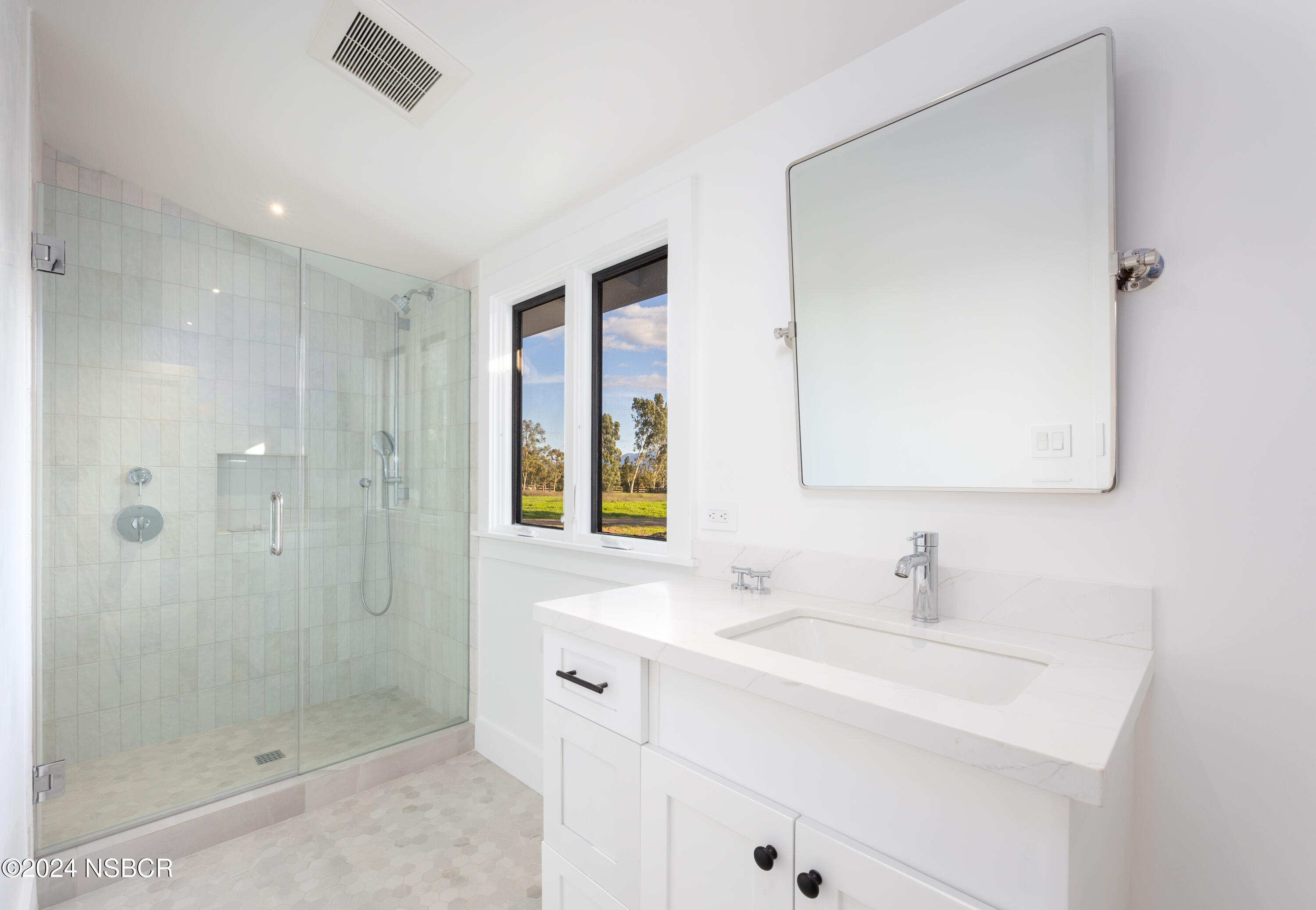 2380 North Refugio Road Santa Ynez, CA 93460 - Photo 31 of 38 a bathroom with a sink a shower and a mirror