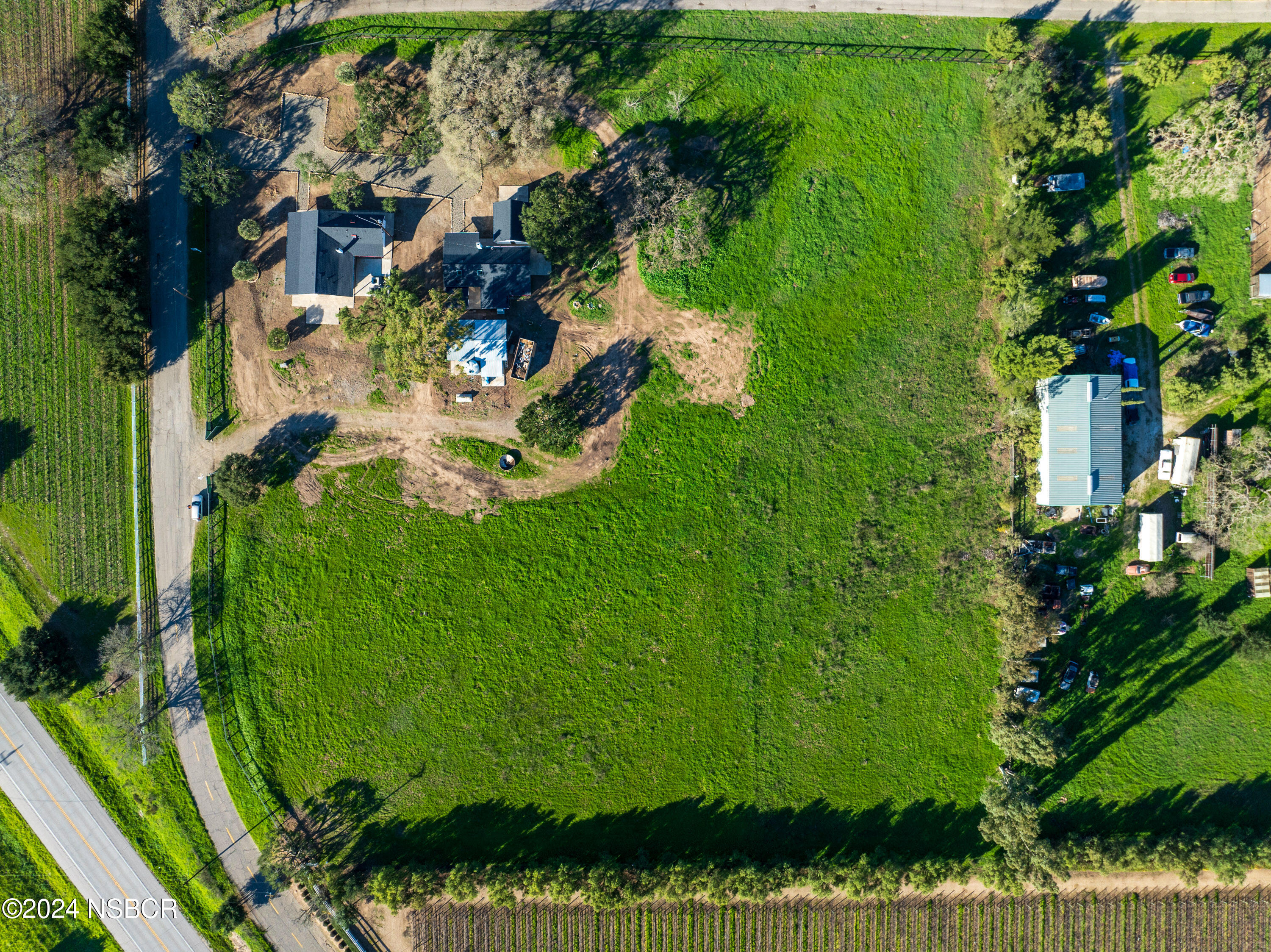 2380 North Refugio Road Santa Ynez, CA 93460 - Photo 32 of 38 a backyard of a house with lots of green space