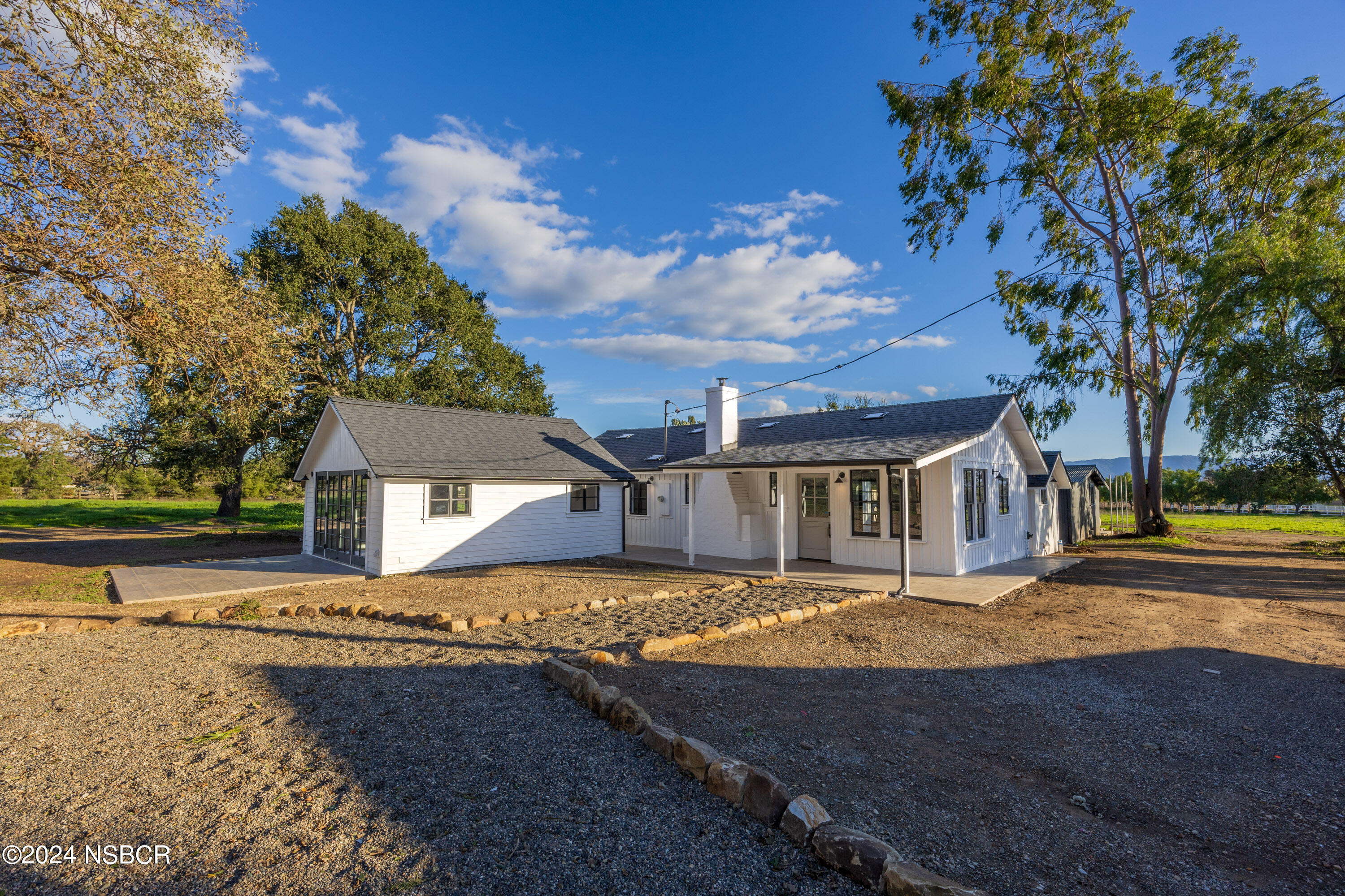 2380 North Refugio Road Santa Ynez, CA 93460 - Photo 7 of 38 front view of a house with a big yard
