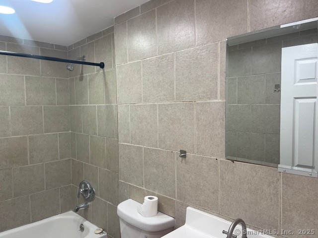 90 Waterville Street Waterbury, CT 06710 - Photo 5 of 20 a bathroom with a shower and a toilet
