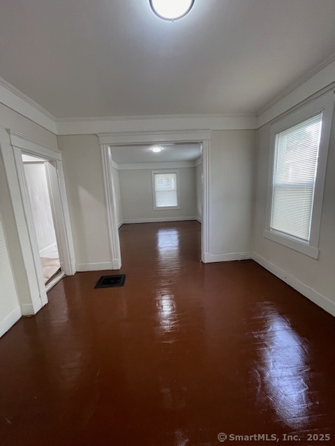 90 Waterville Street Waterbury, CT 06710 - Photo 7 of 20 a view of empty room with wooden floor and fan