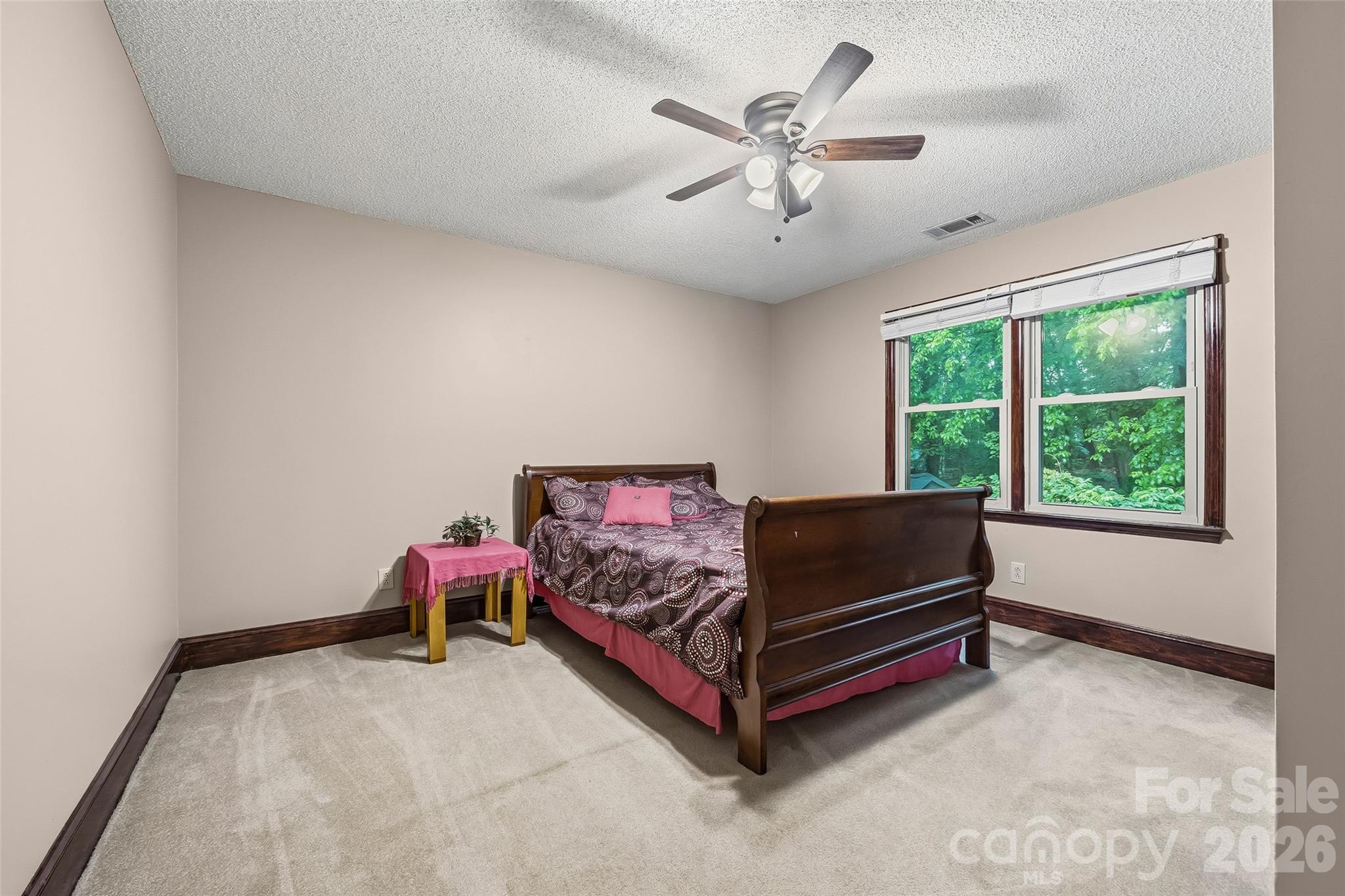 1596 Old Tara Lane Fort Mill, SC 29708 - Photo 24 of 47 a bed room with a bed and a window