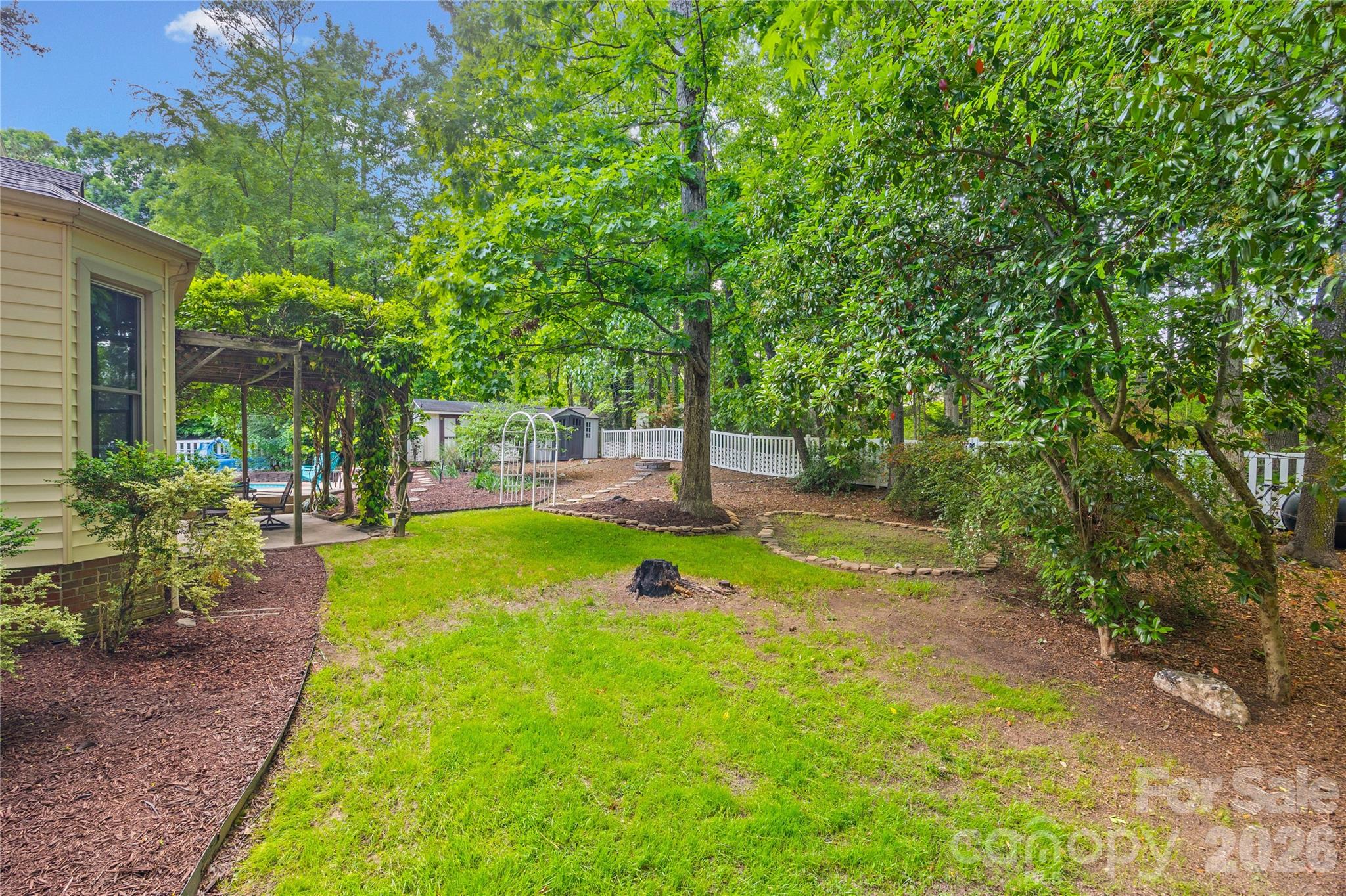 1596 Old Tara Lane Fort Mill, SC 29708 - Photo 39 of 47 a view of a backyard with sitting area