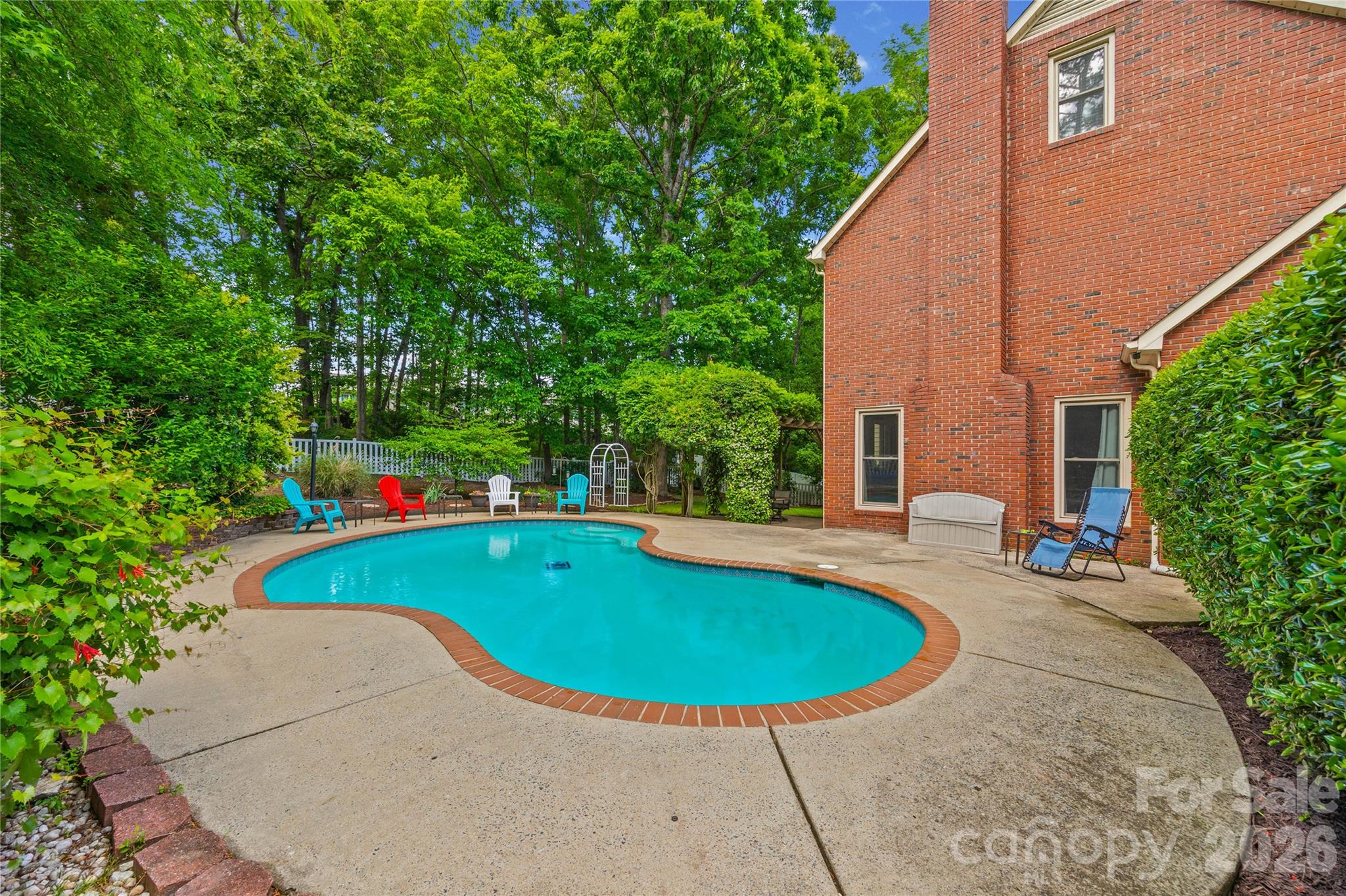 1596 Old Tara Lane Fort Mill, SC 29708 - Photo 43 of 47 a view of a swimming pool with a patio